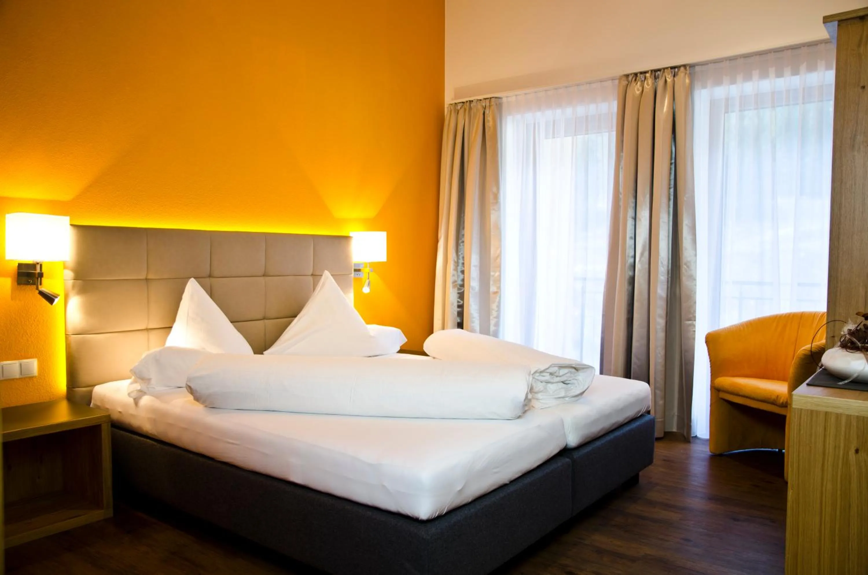 Bed in Hotel Garni Alpenland