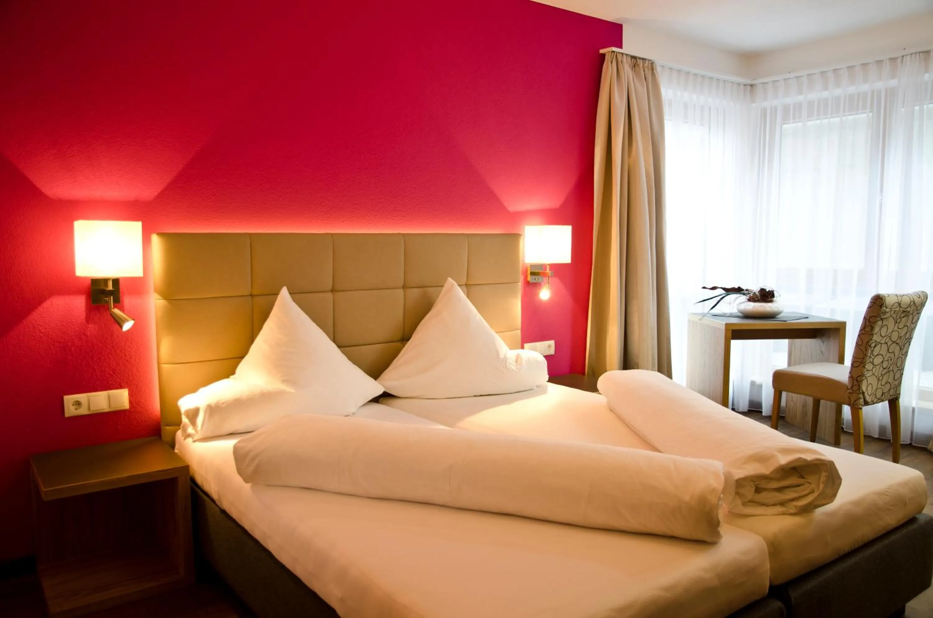 Bedroom in Hotel Garni Alpenland