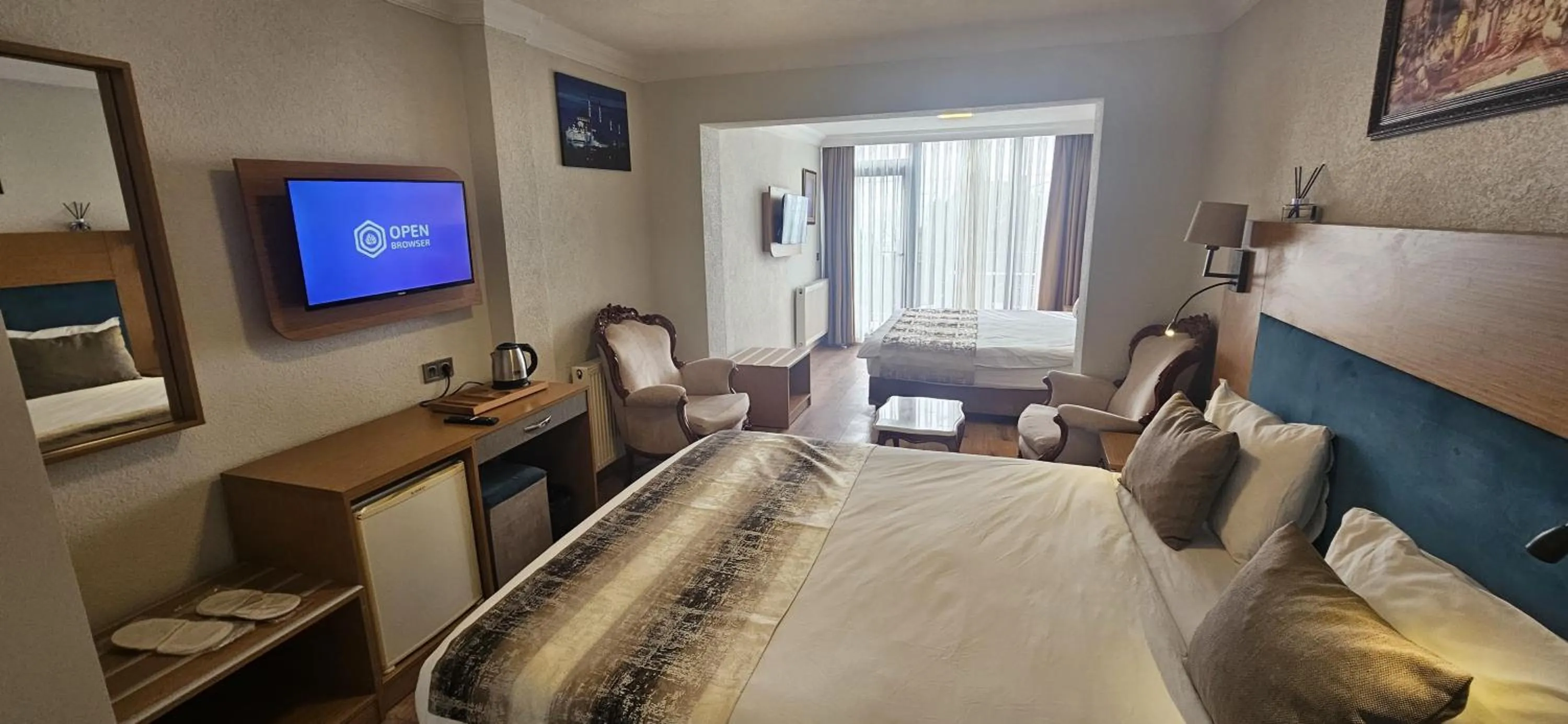 Communal lounge/ TV room, Bed in Seatanbul Hotel