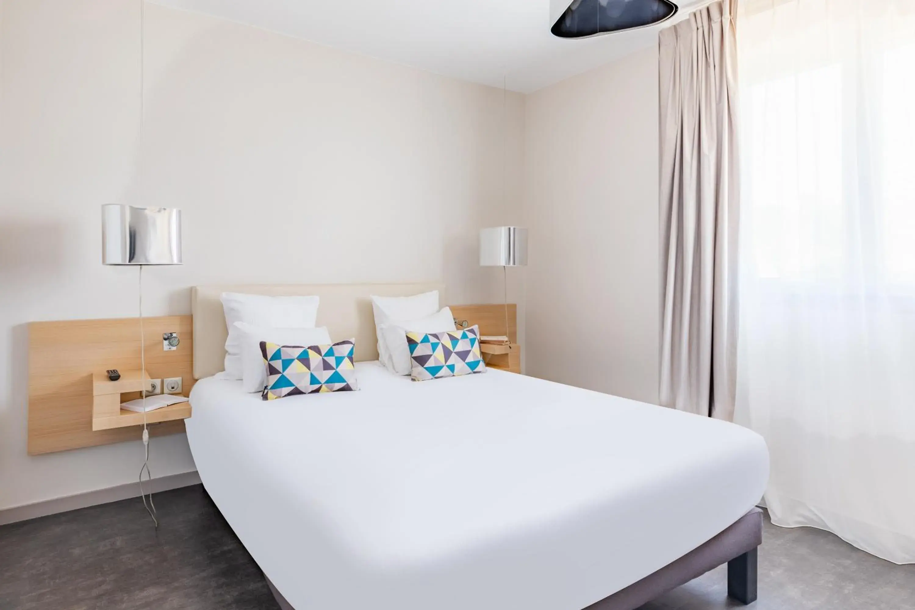 Bed in Appart’City Confort Lyon Cité Internationale Bed in Appart’City Confort Lyon Cité Internationale