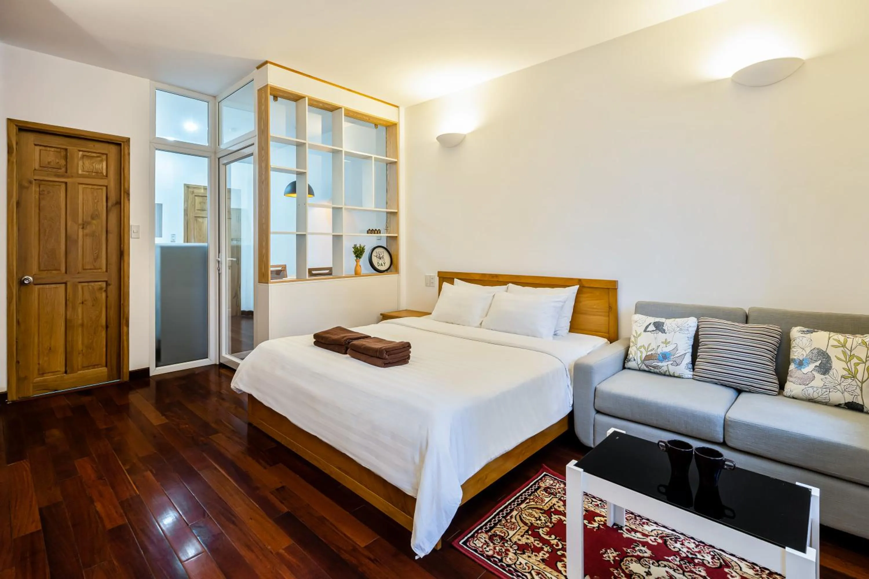 Living room, Bed in SaigonOne Serviced Apartment