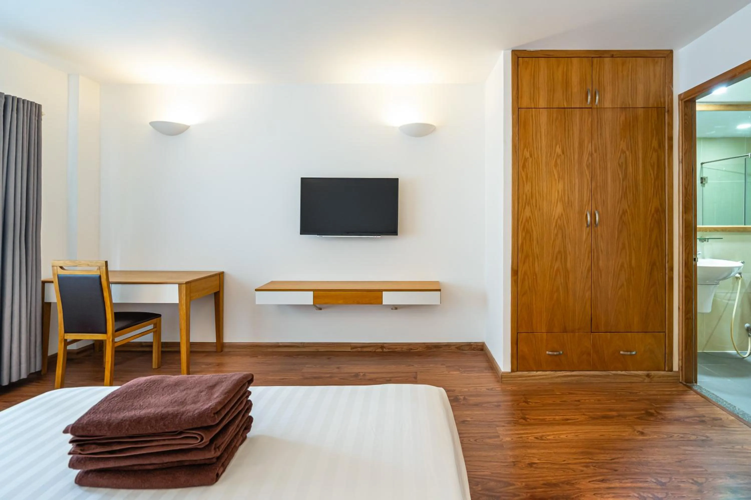 TV and multimedia, Bed in SaigonOne Serviced Apartment