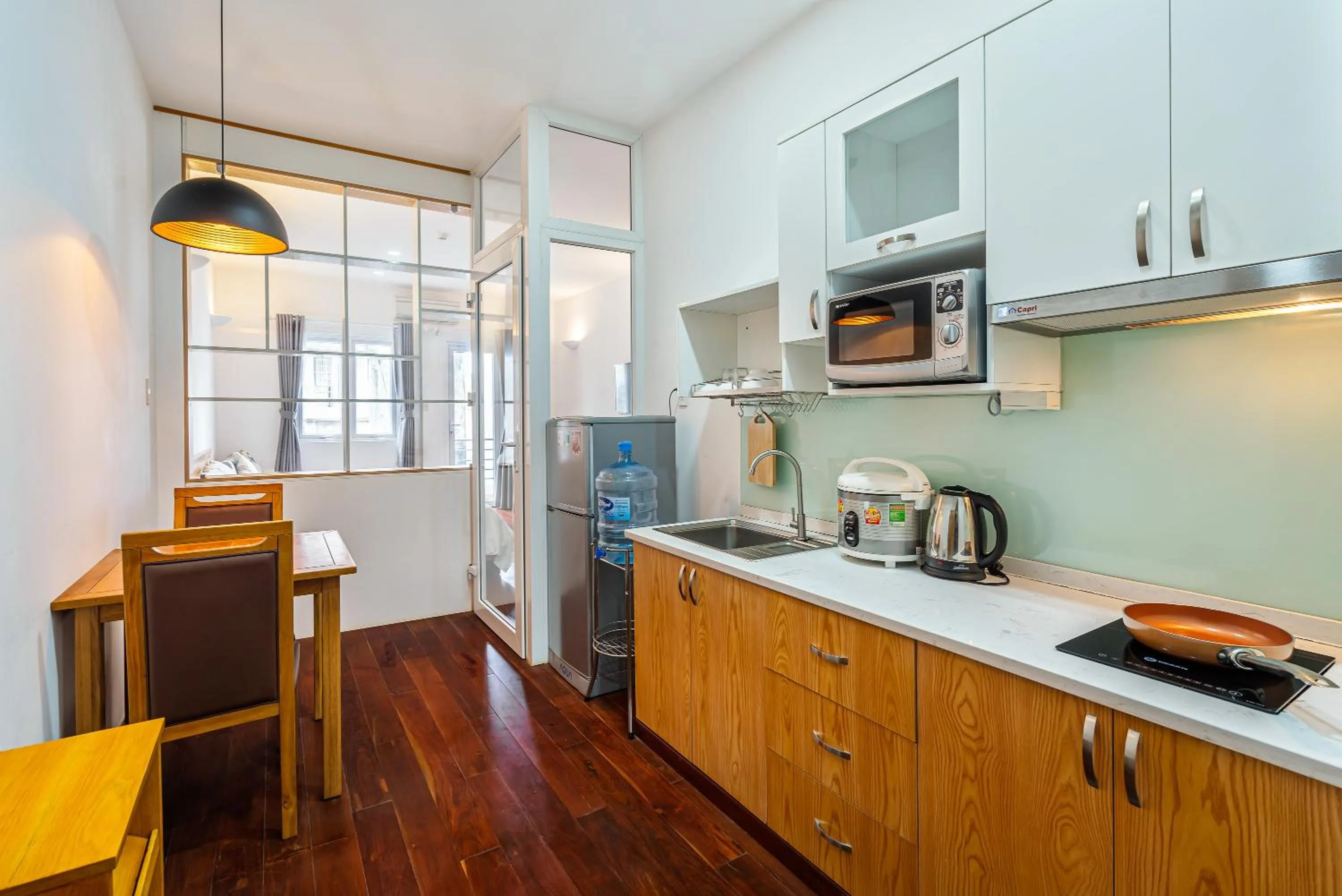 Kitchen or kitchenette in SaigonOne Serviced Apartment