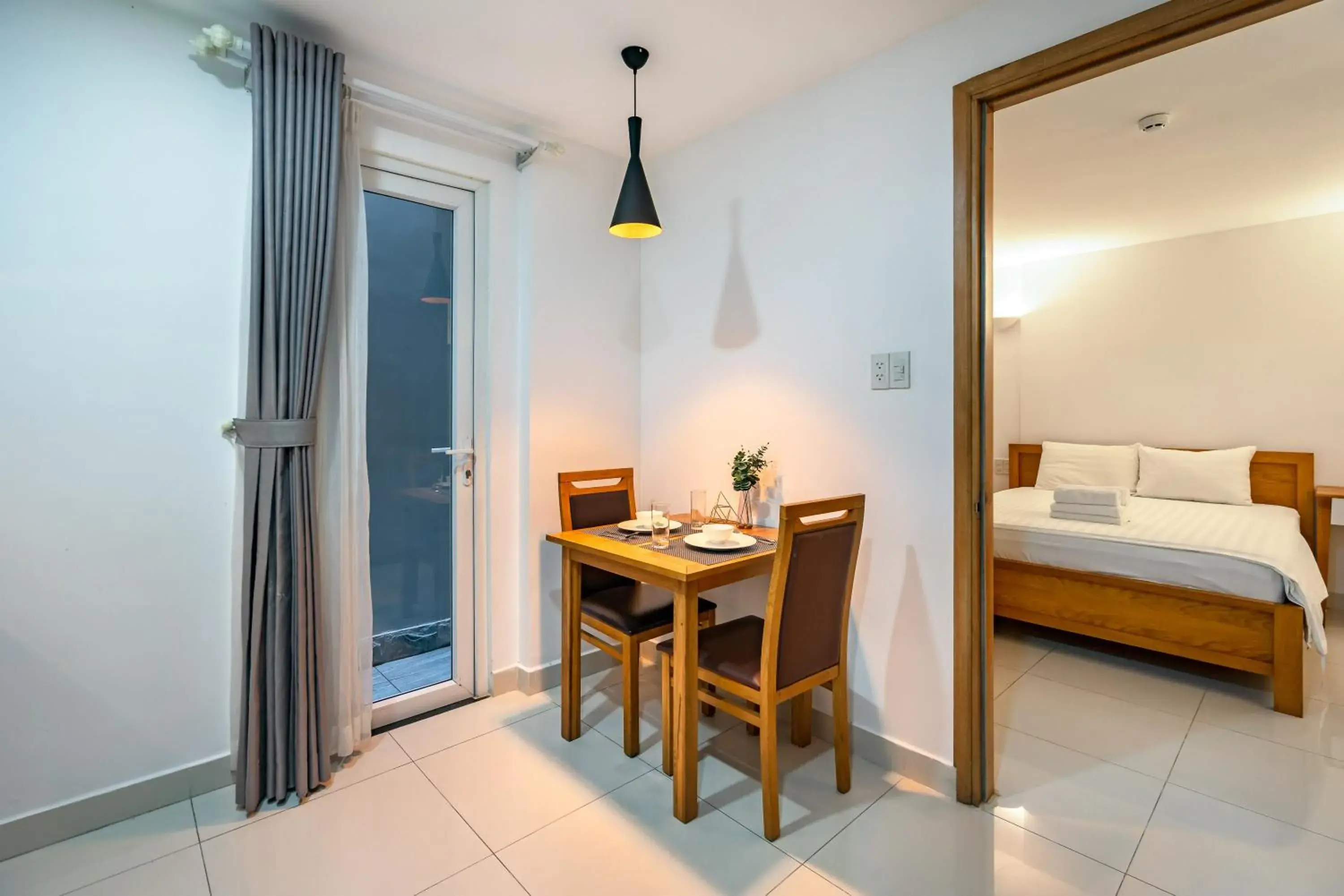 Dining area, Bed in SaigonOne Serviced Apartment Dining area, Bed in SaigonOne Serviced Apartment