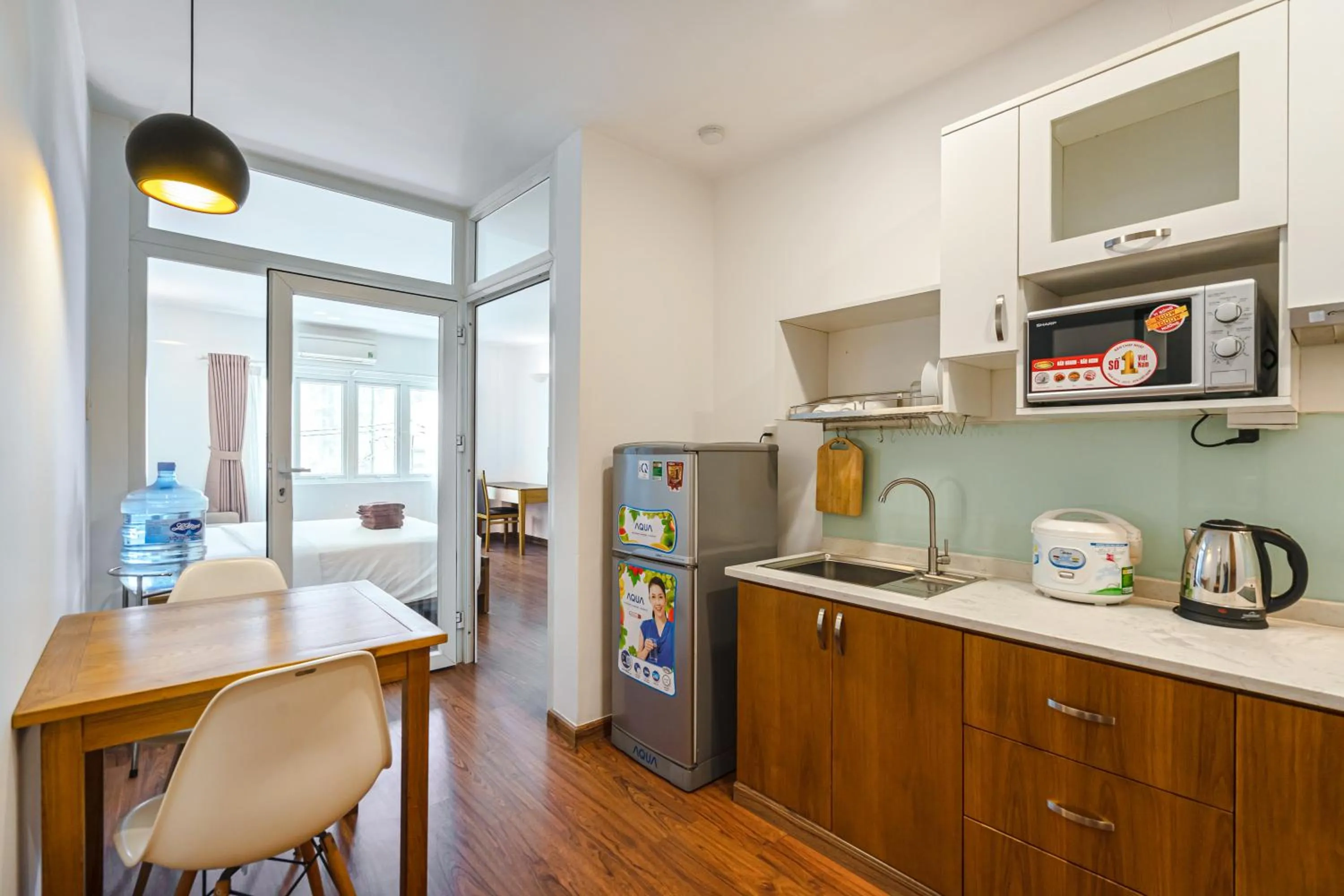 Kitchen or kitchenette in SaigonOne Serviced Apartment