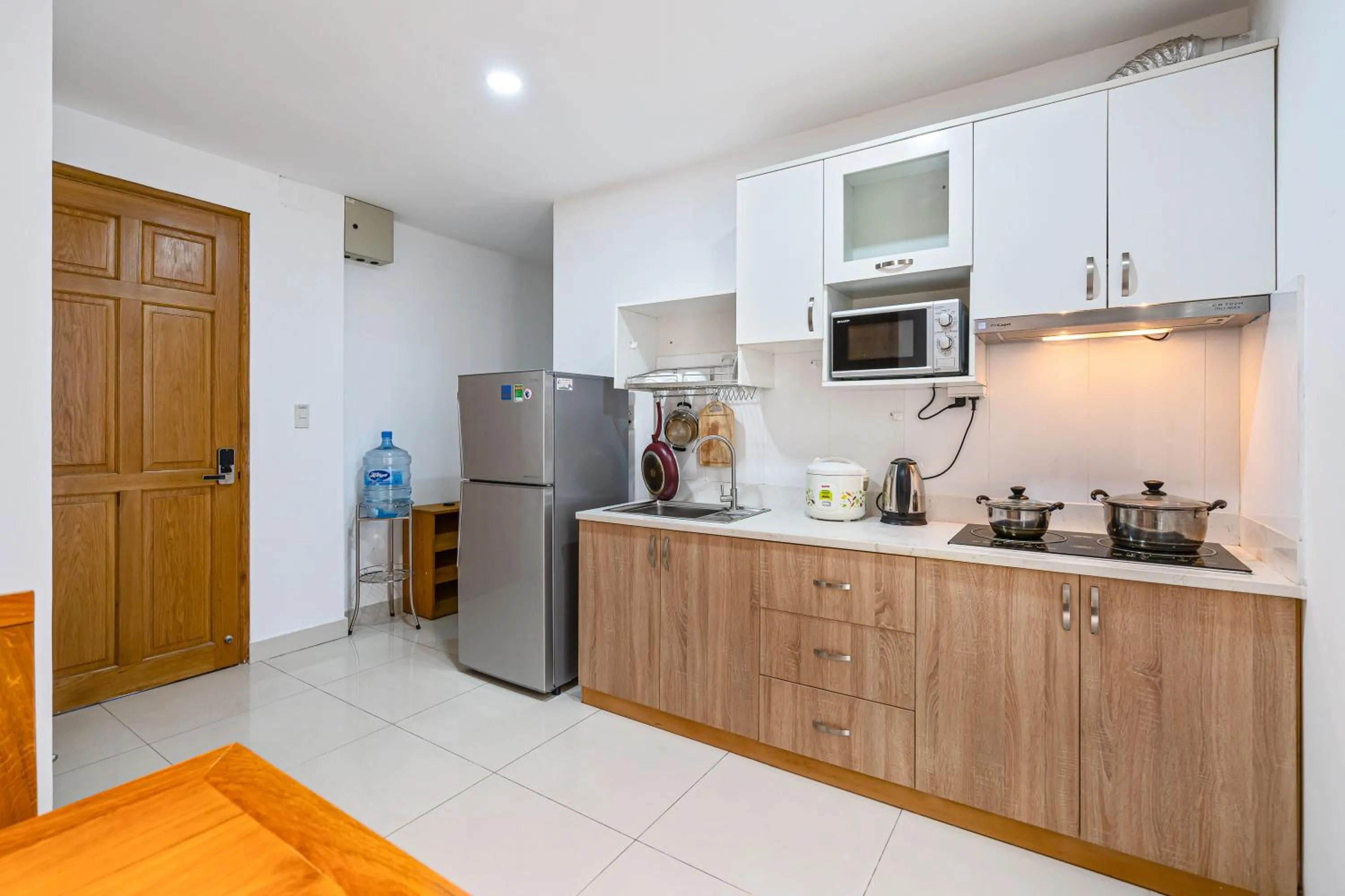 Kitchen or kitchenette in SaigonOne Serviced Apartment