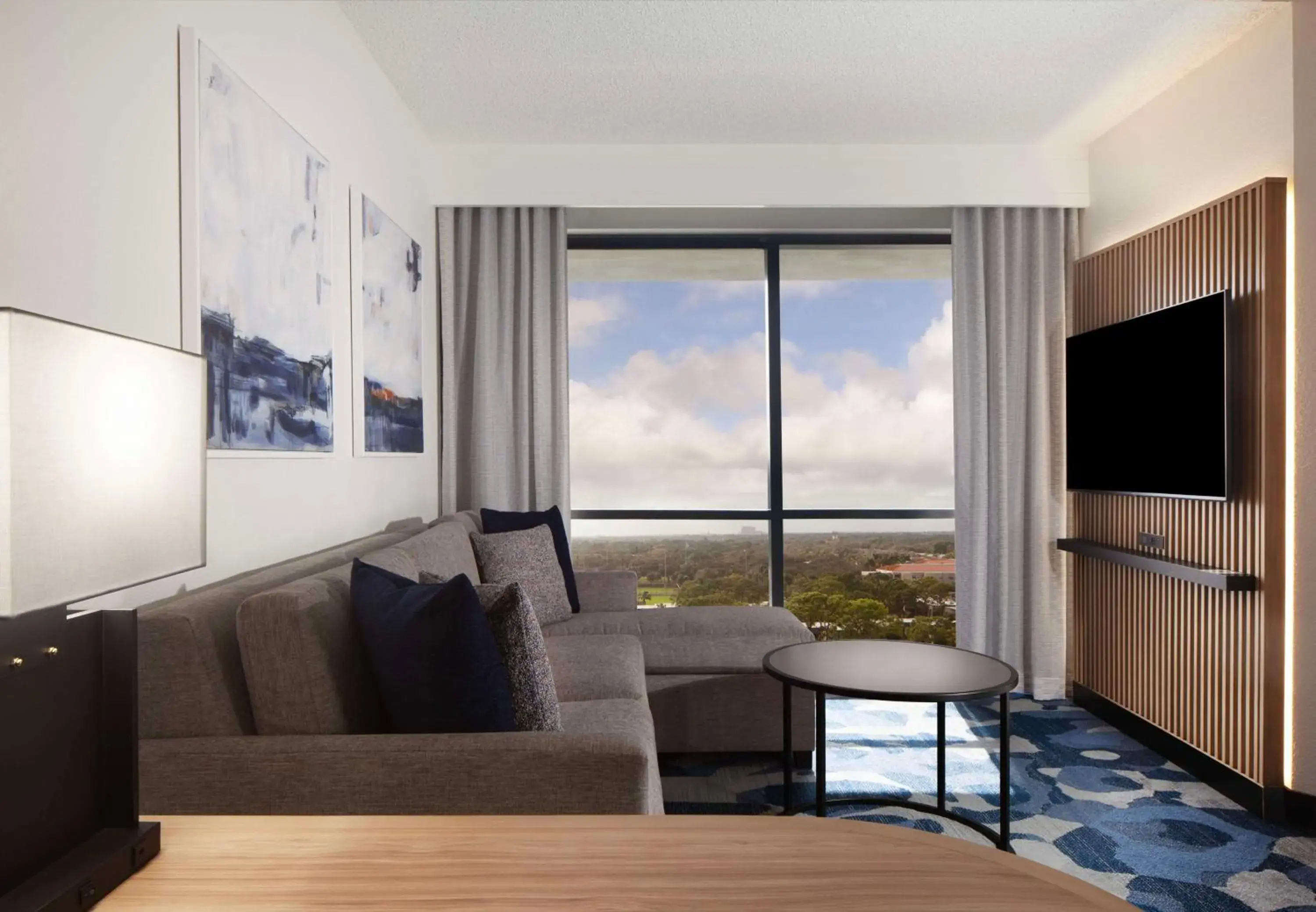 Living room in Embassy Suites by Hilton Palm Beach Gardens PGA Boulevard Living room in Embassy Suites by Hilton Palm Beach Gardens PGA Boulevard