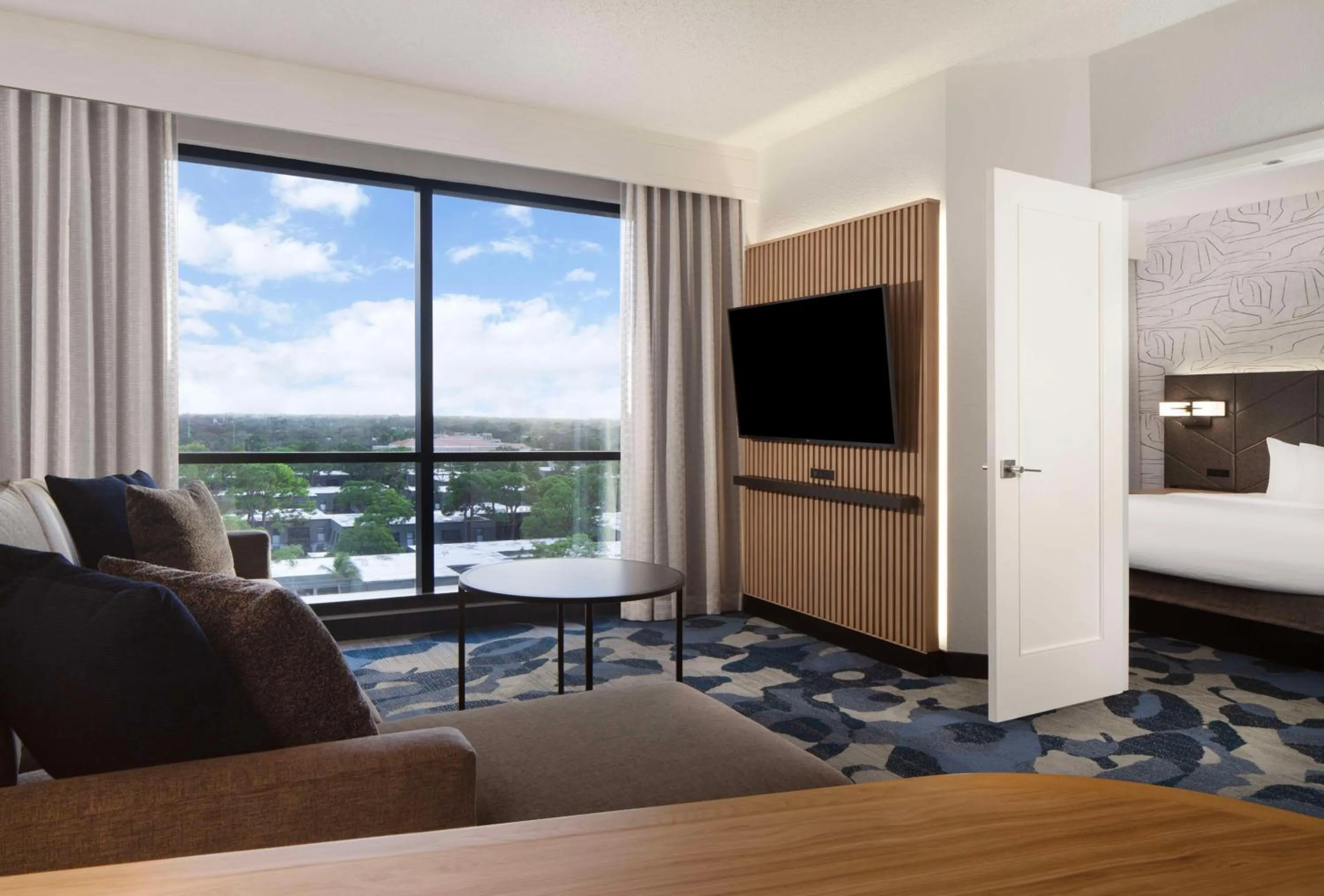 Living room, Bed in Embassy Suites by Hilton Palm Beach Gardens PGA Boulevard