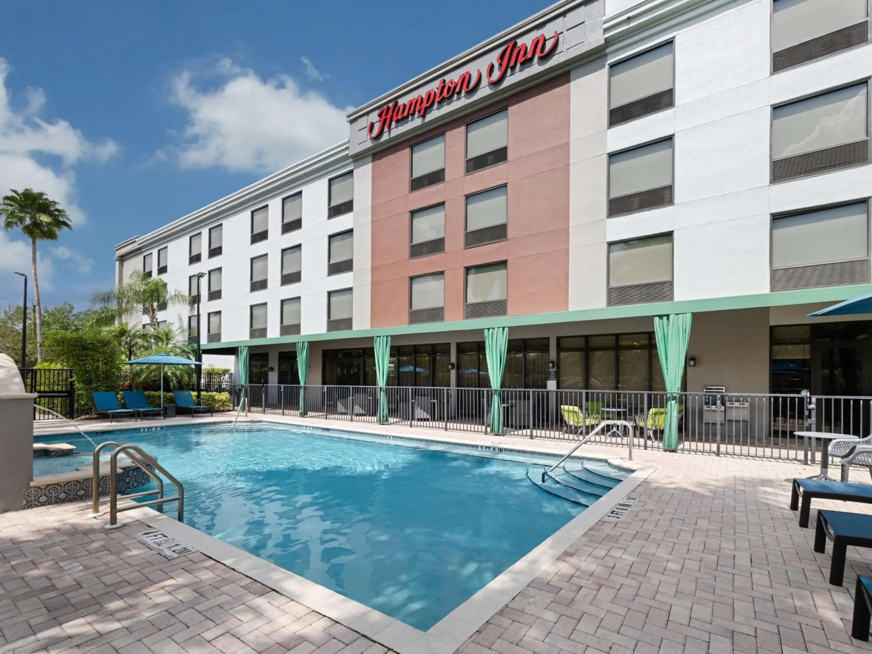 Pool view in Hampton Inn West Palm Beach-Florida Turnpike Pool view in Hampton Inn West Palm Beach-Florida Turnpike