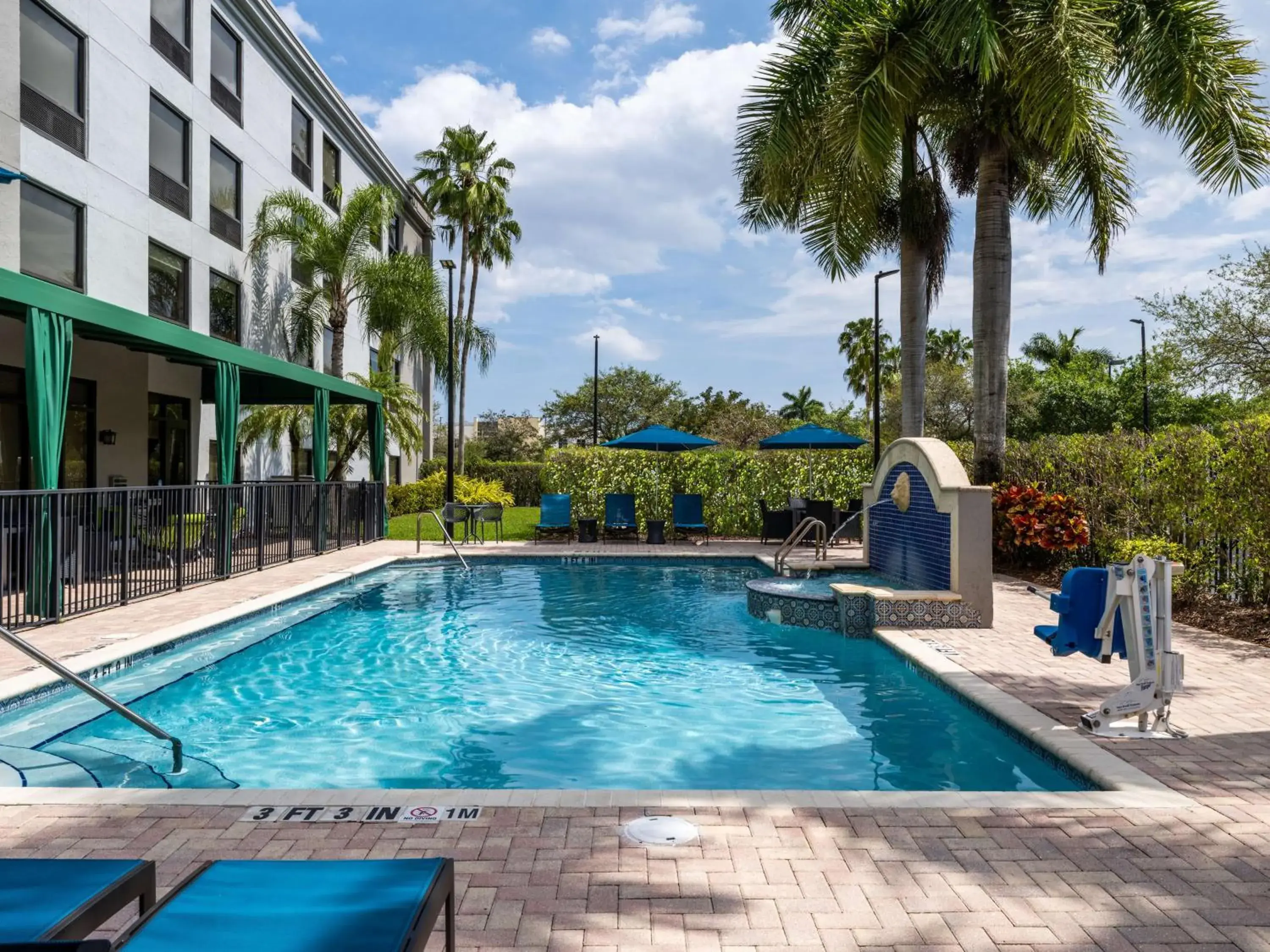 Pool view in Hampton Inn West Palm Beach-Florida Turnpike Pool view in Hampton Inn West Palm Beach-Florida Turnpike