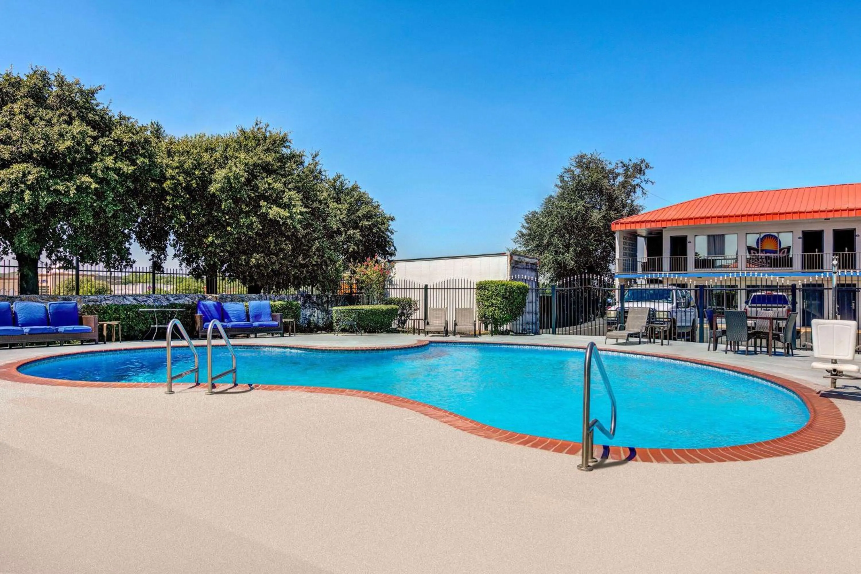 Swimming pool in Days Inn by Wyndham South Fort Worth