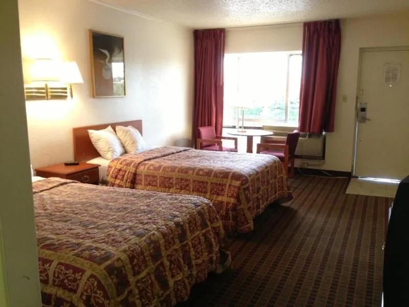 Bed in Days Inn by Wyndham South Fort Worth