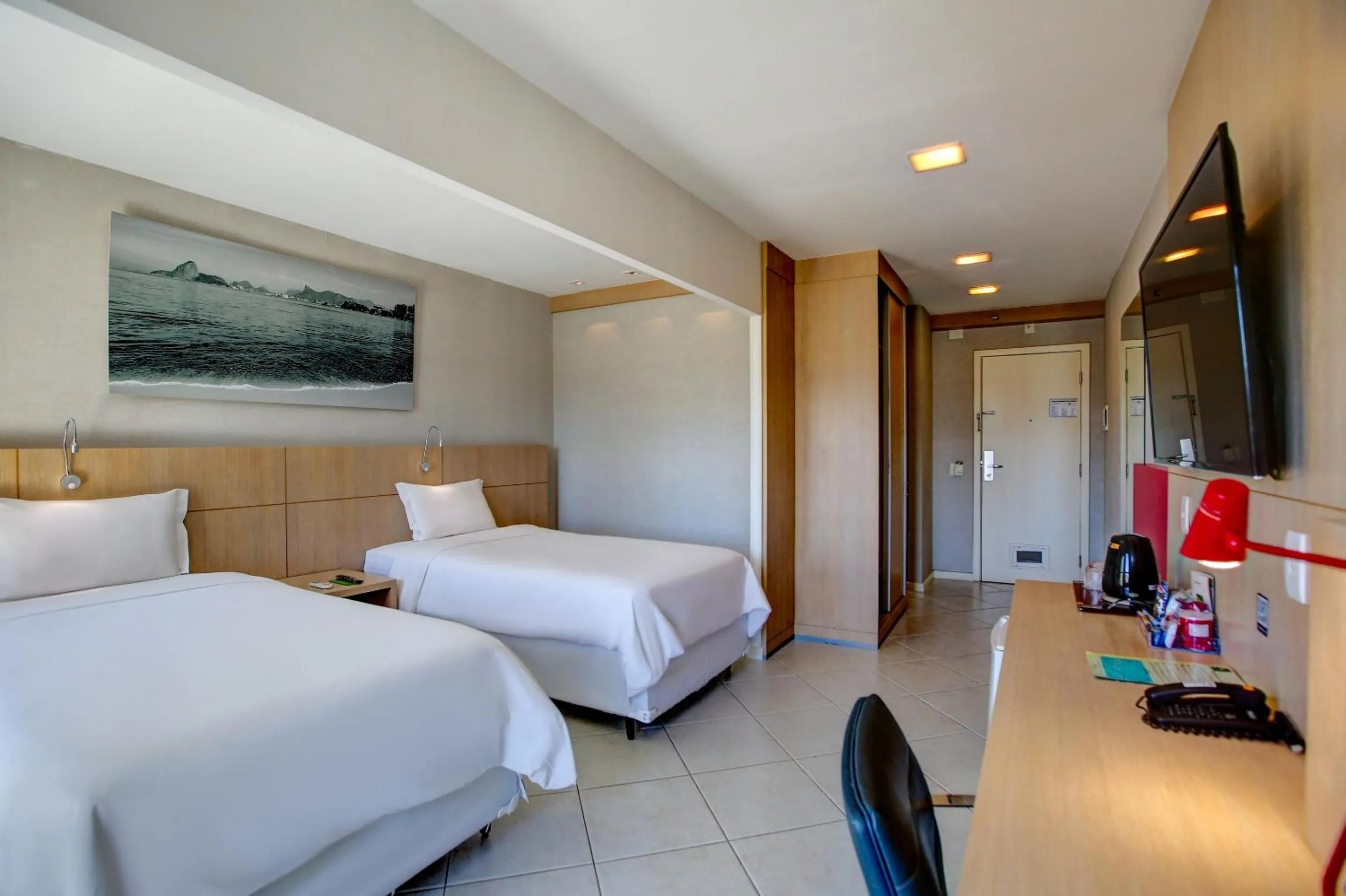 Photo of the whole room, Bed in Quality Rio de Janeiro - Barra da Tijuca
