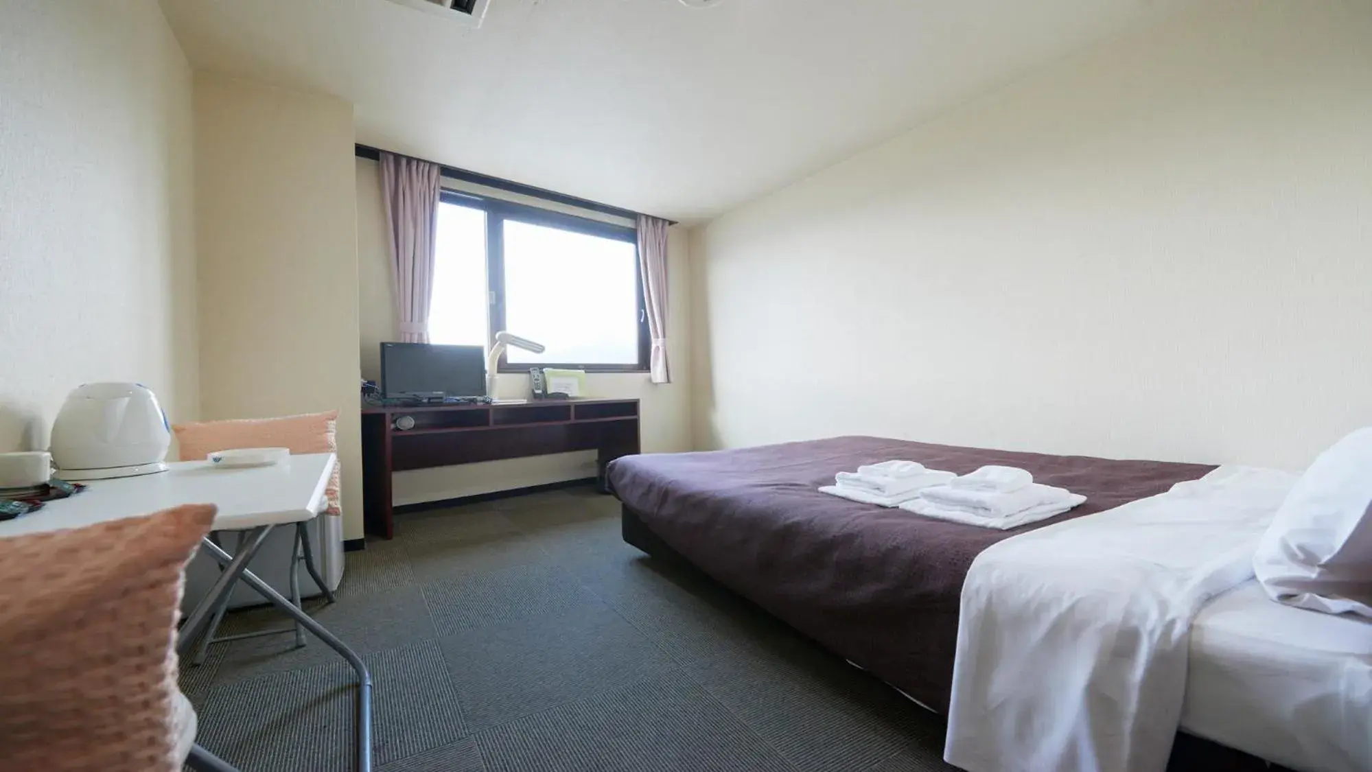 Bed in Select Inn Tsuruga Bed in Select Inn Tsuruga