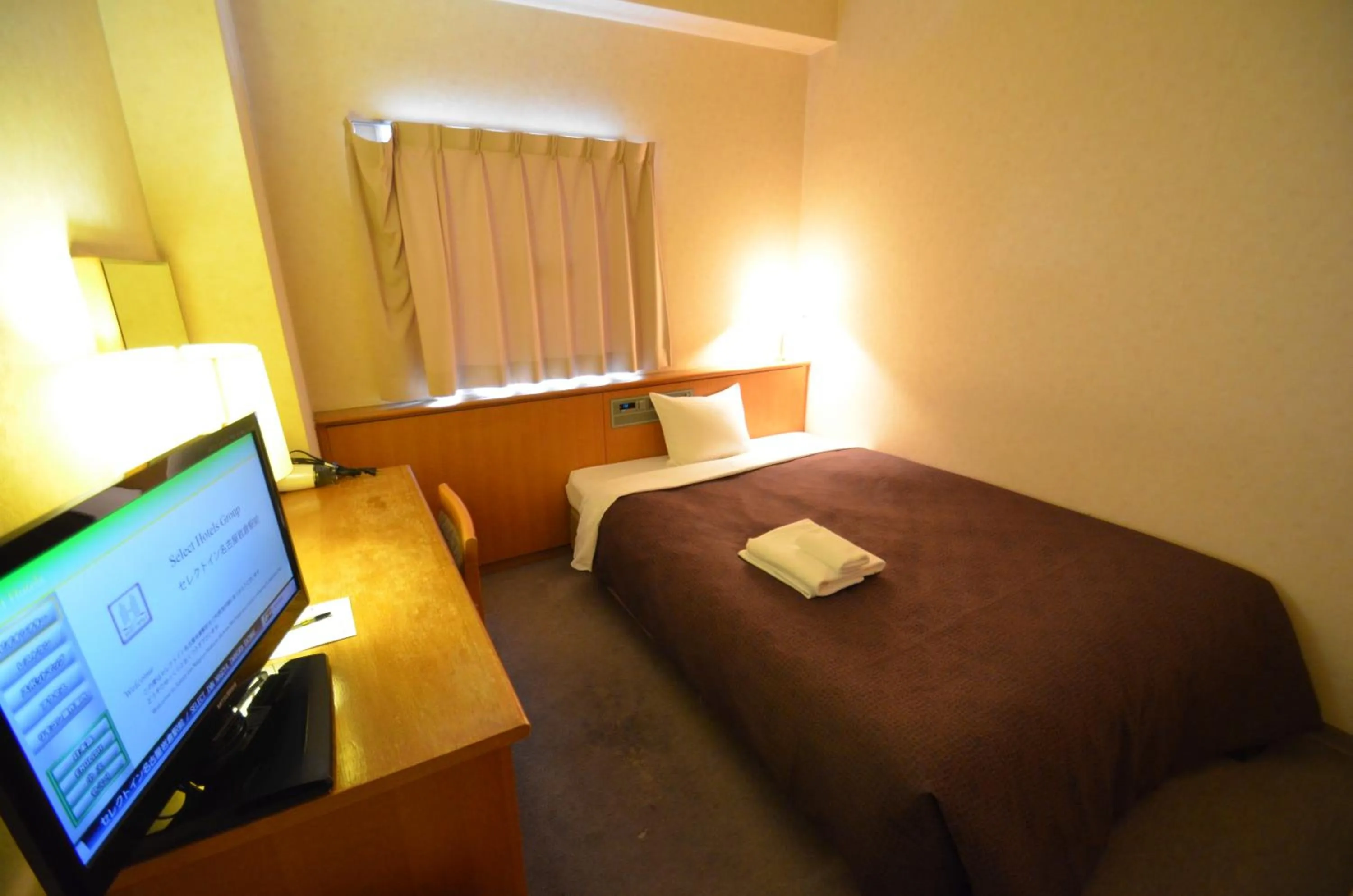 Photo of the whole room, Bed in Select Inn Nagoya Iwakura Eki-mae