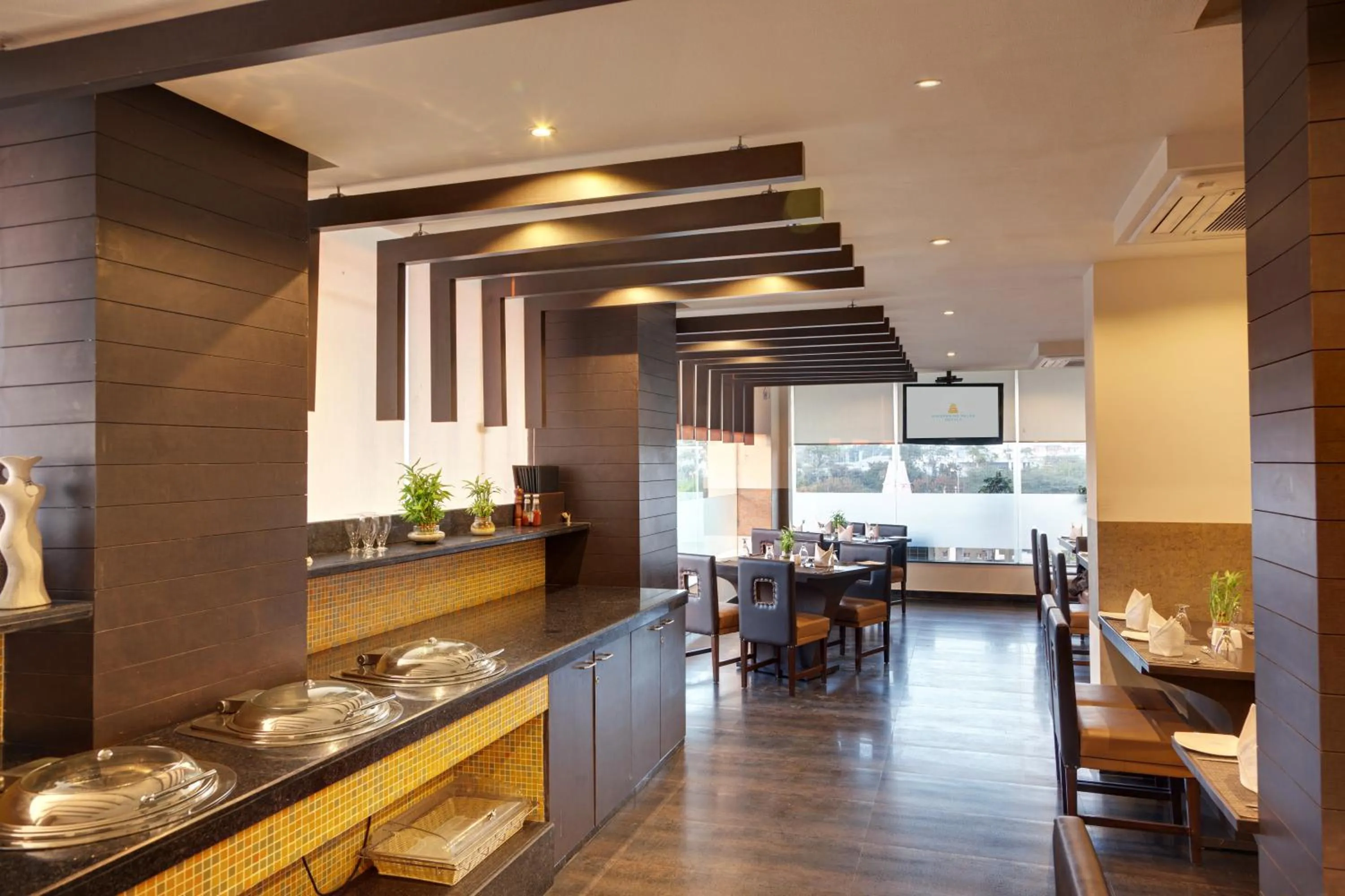 Dining area in Whispering Palms Hotel Jaipur