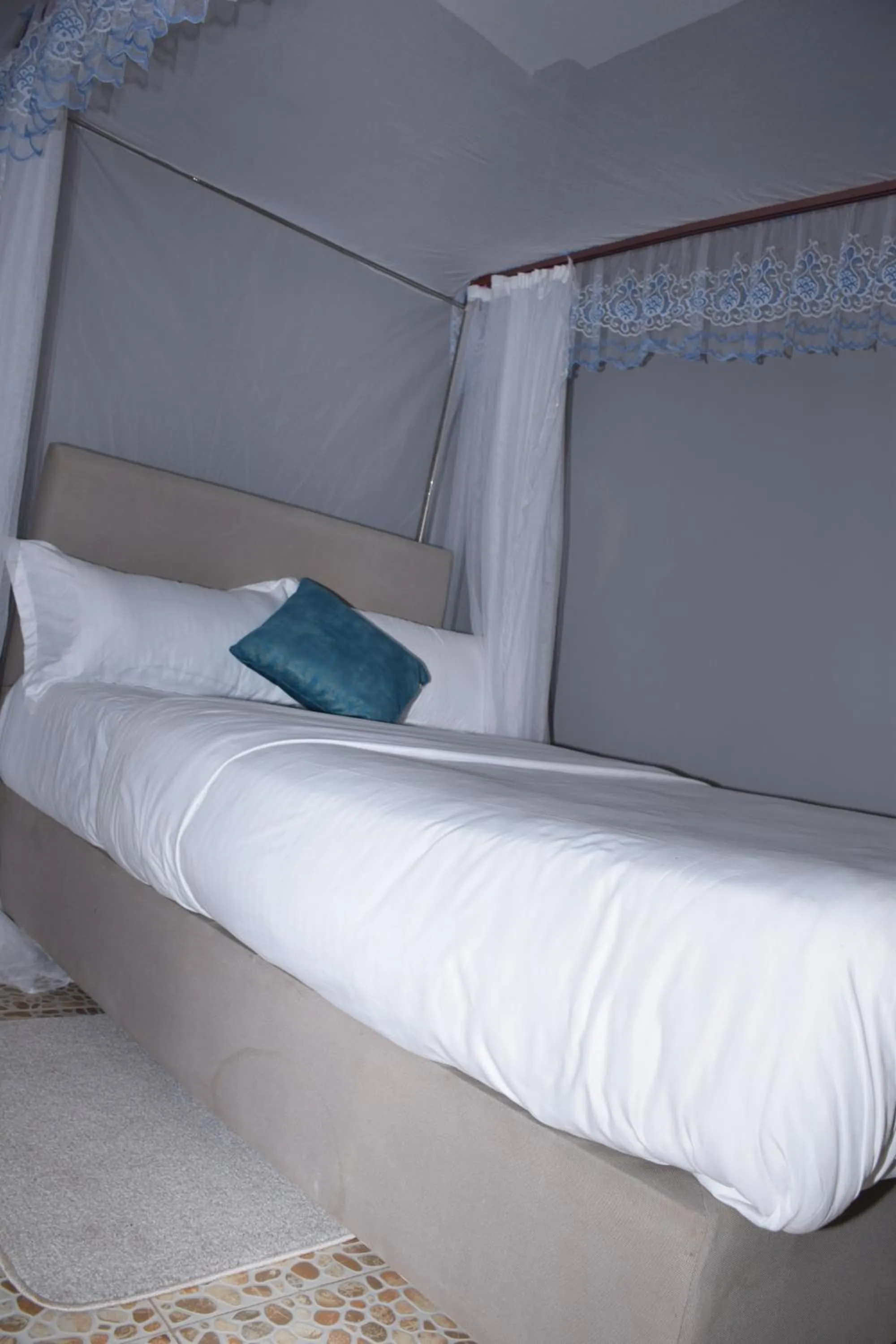 Bed in Zarita Boutique Hotel