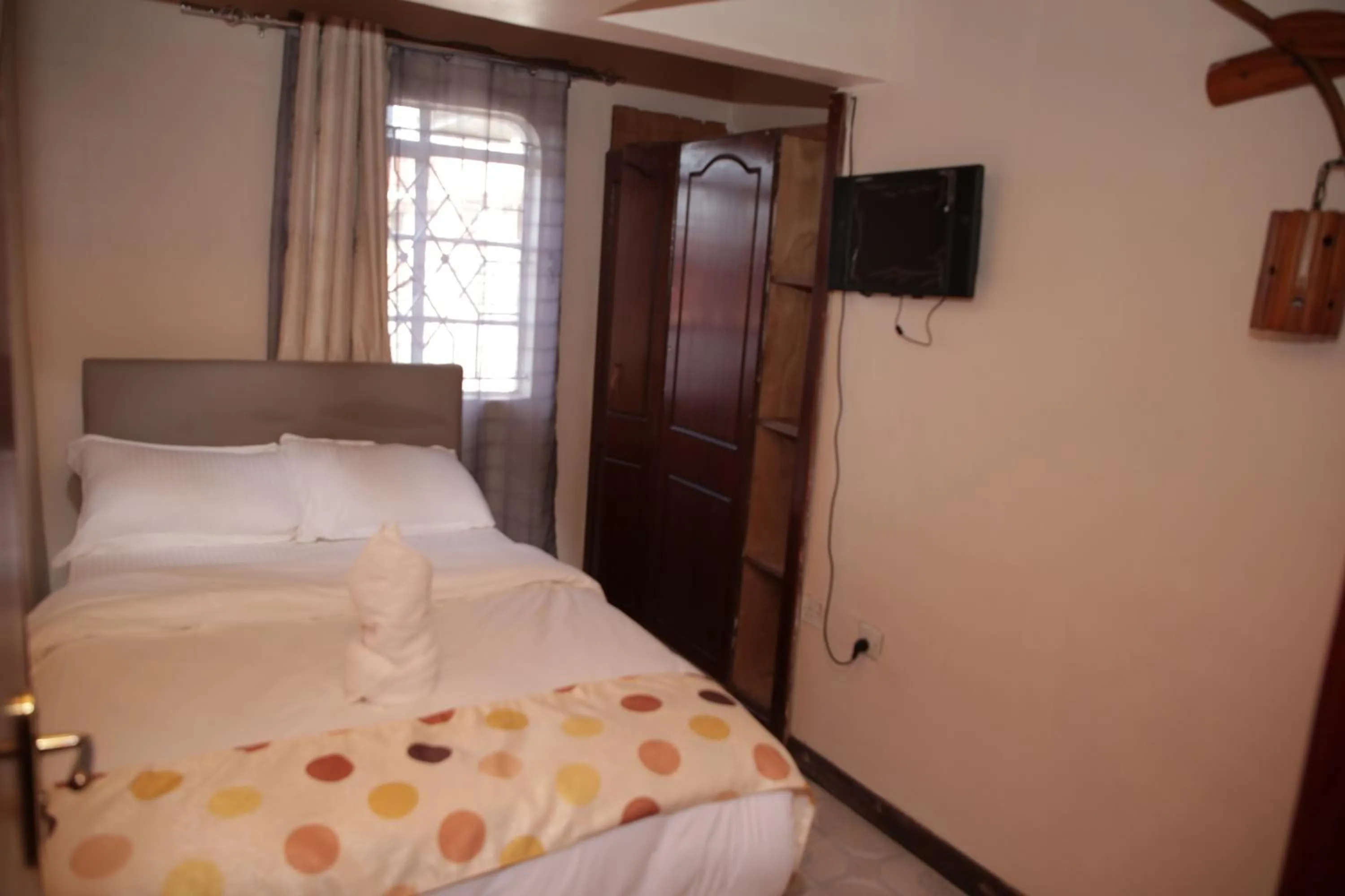 Bed in Zarita Boutique Hotel