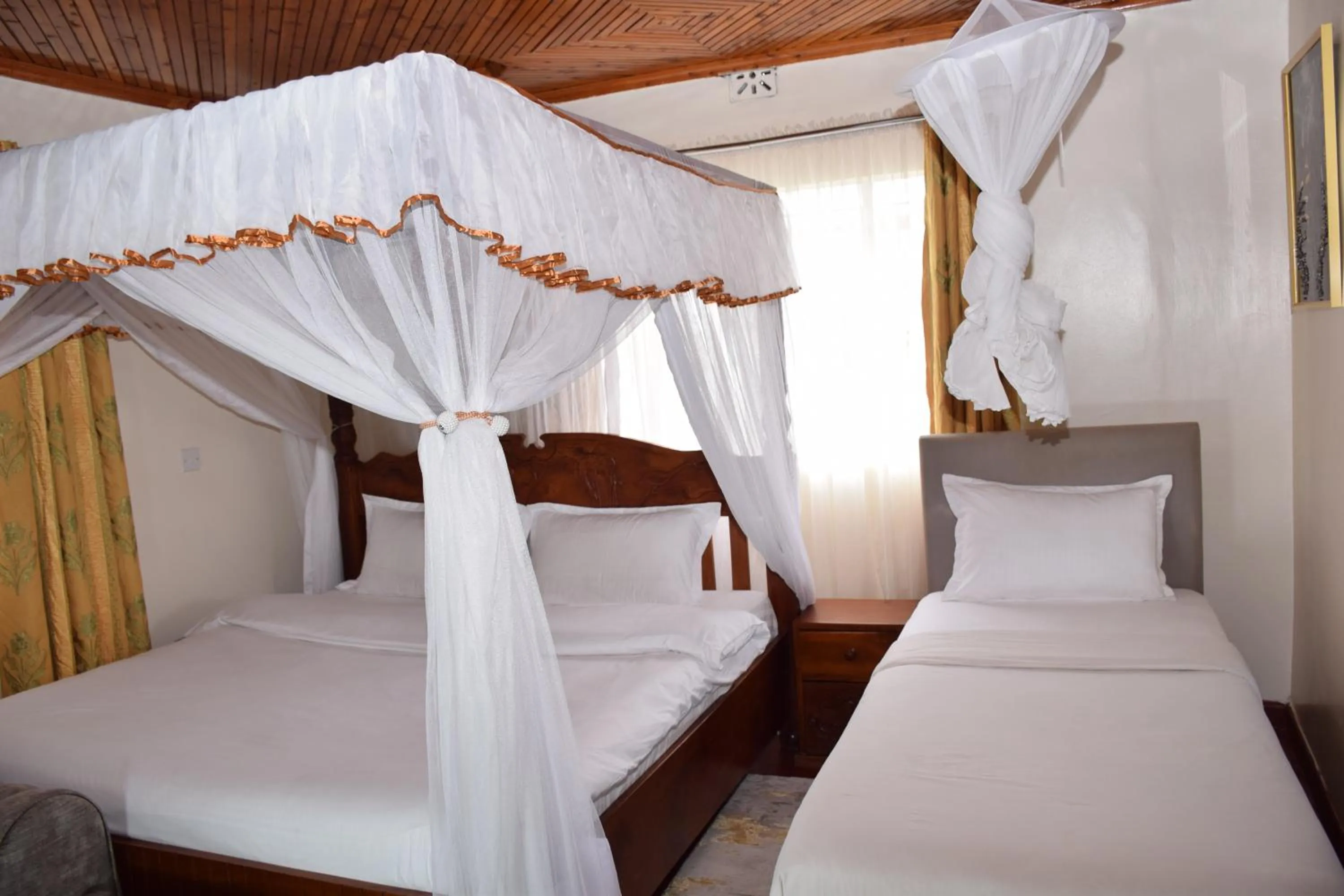 Bed in Zarita Boutique Hotel