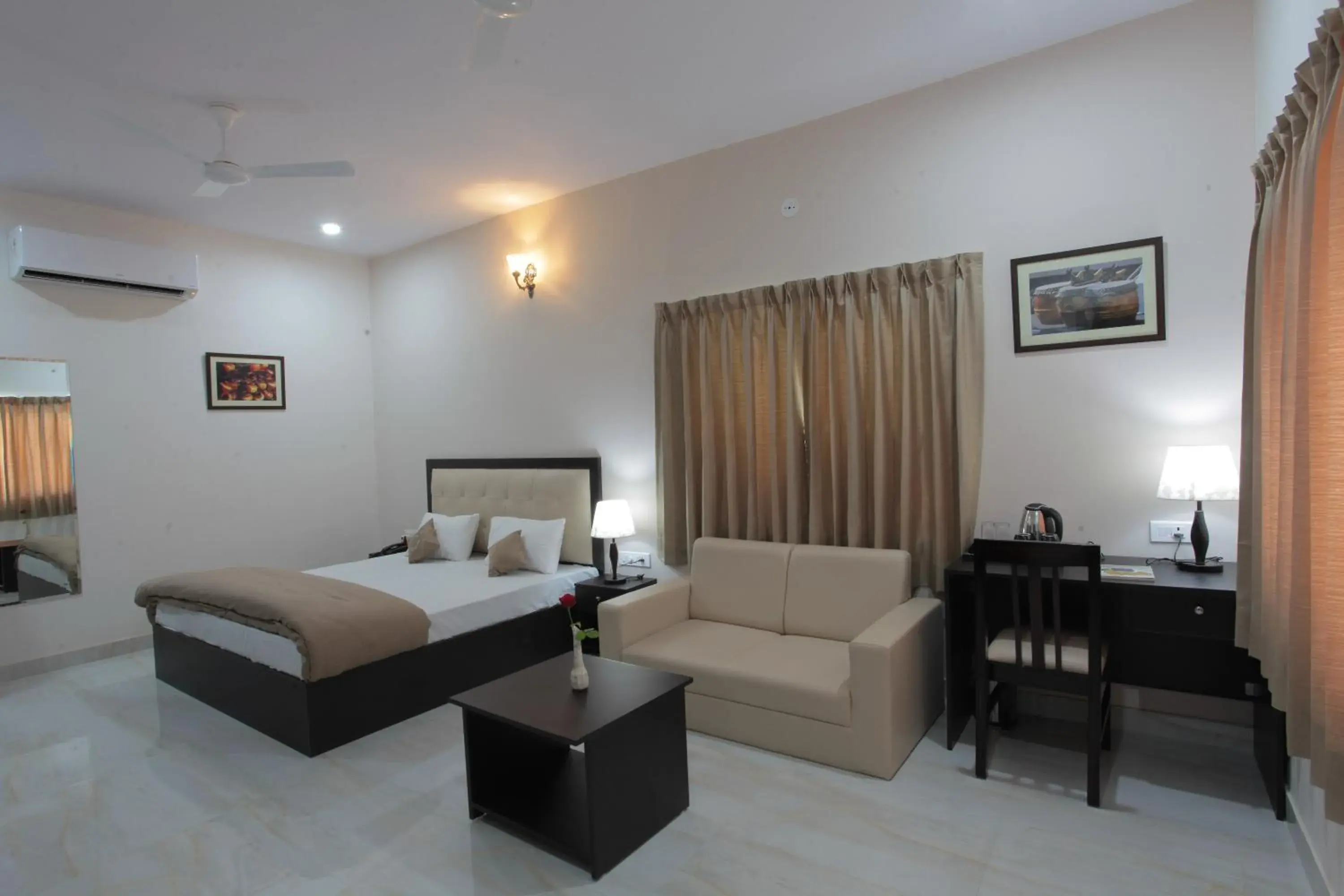 Deluxe Double Room with Balcony in Mimosa Udaipur Deluxe Double Room with Balcony in Mimosa Udaipur