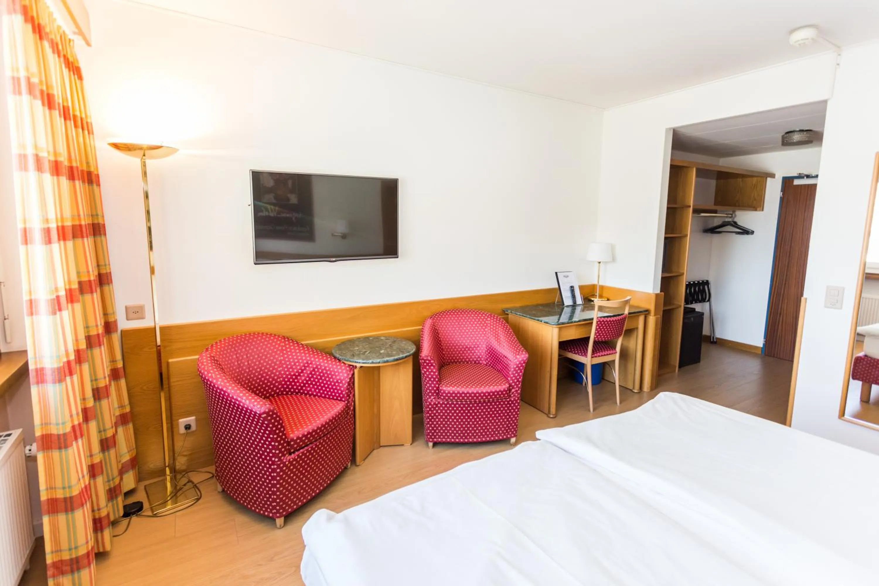 Bedroom in Hôtel du Rhône