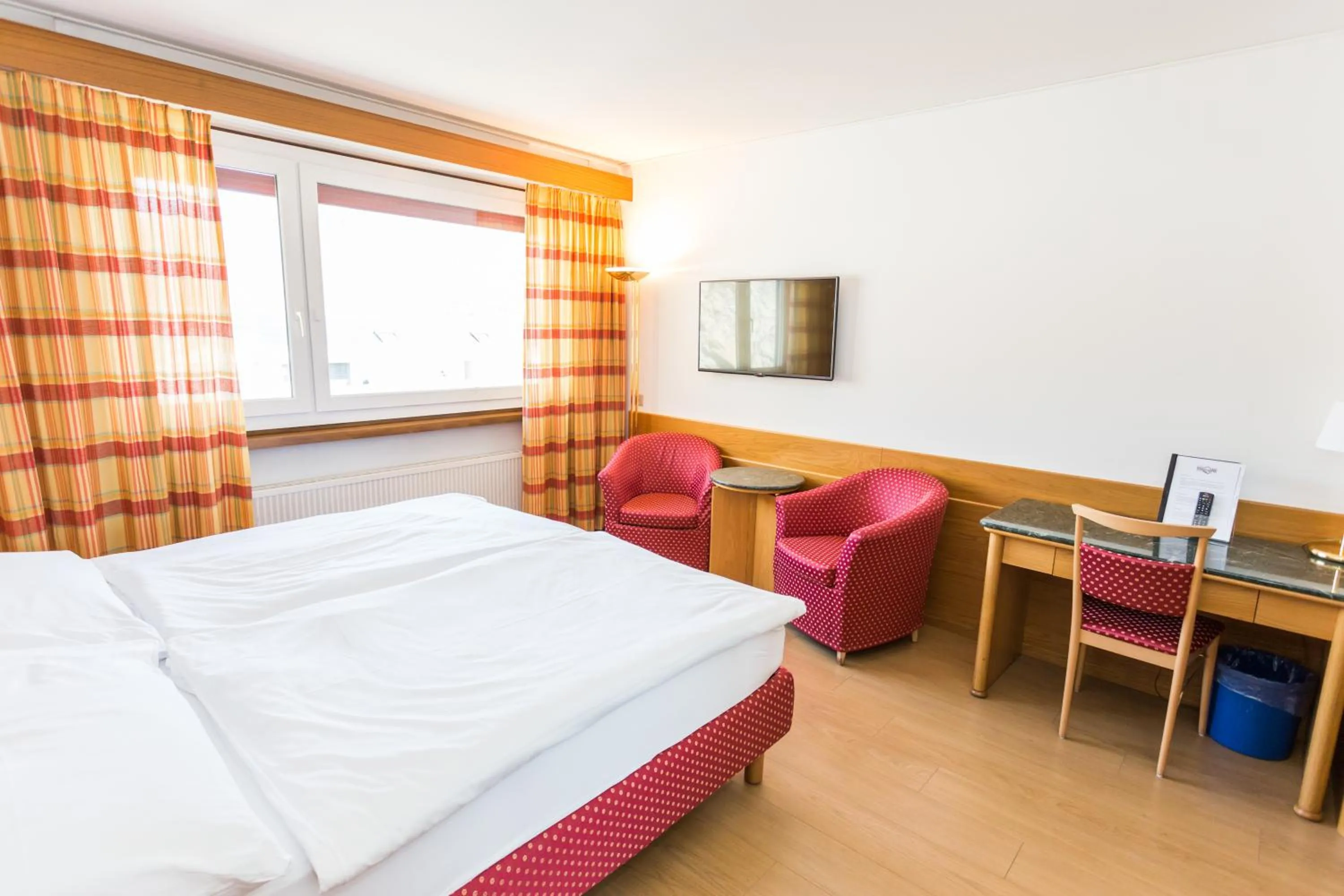 Bedroom in Hôtel du Rhône