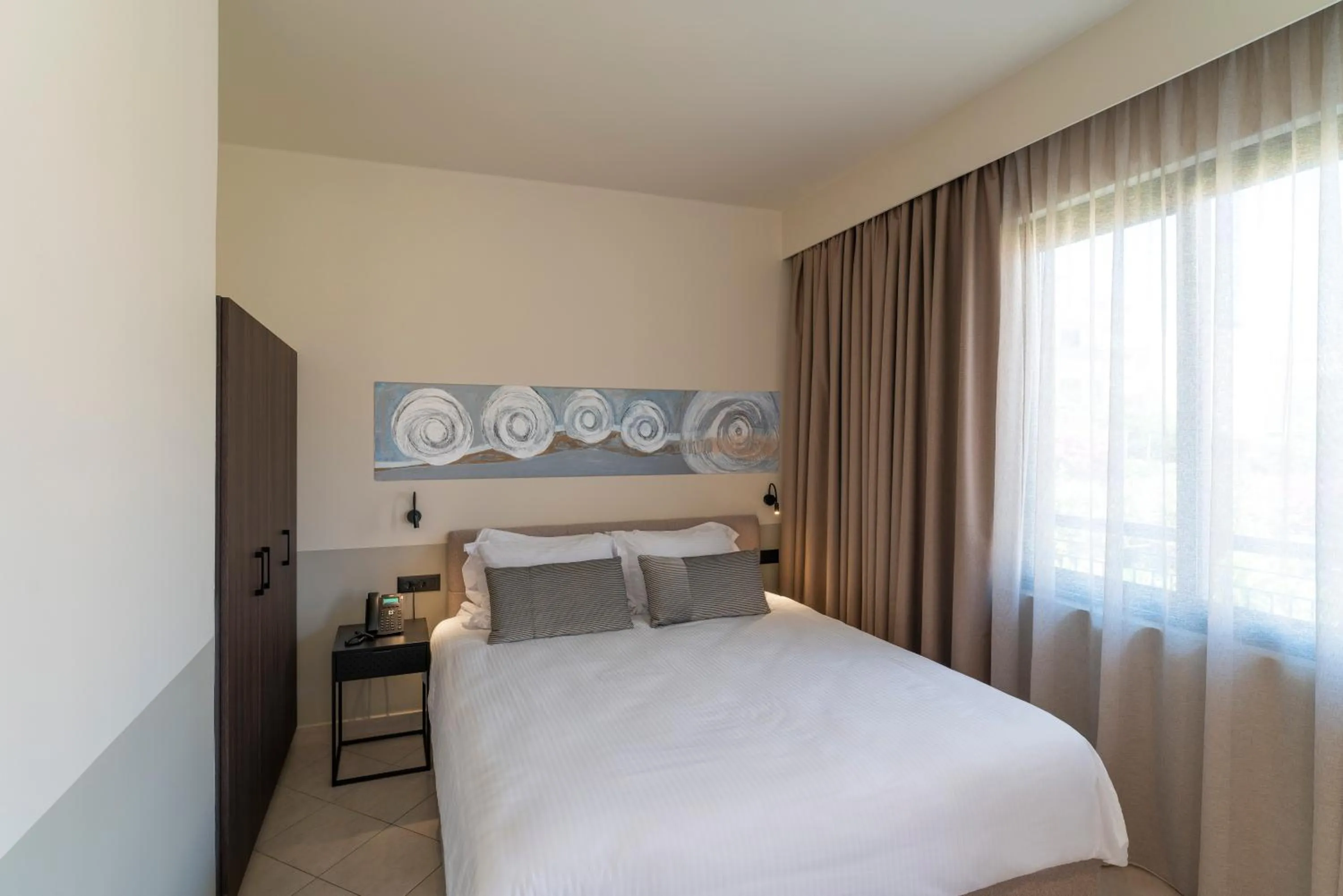 Bed in Mariette Rhodes Urban Suites