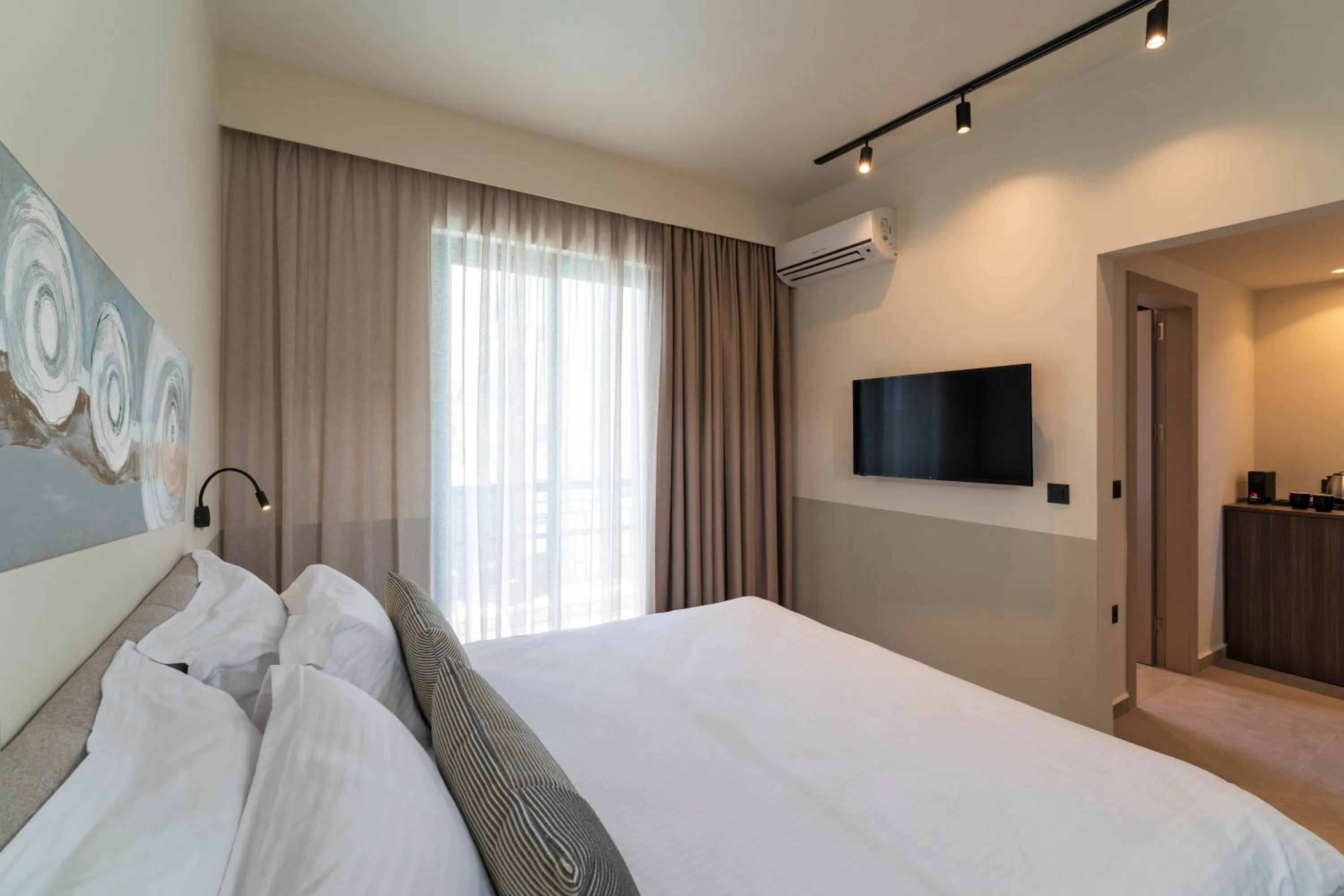 Bed in Mariette Rhodes Urban Suites