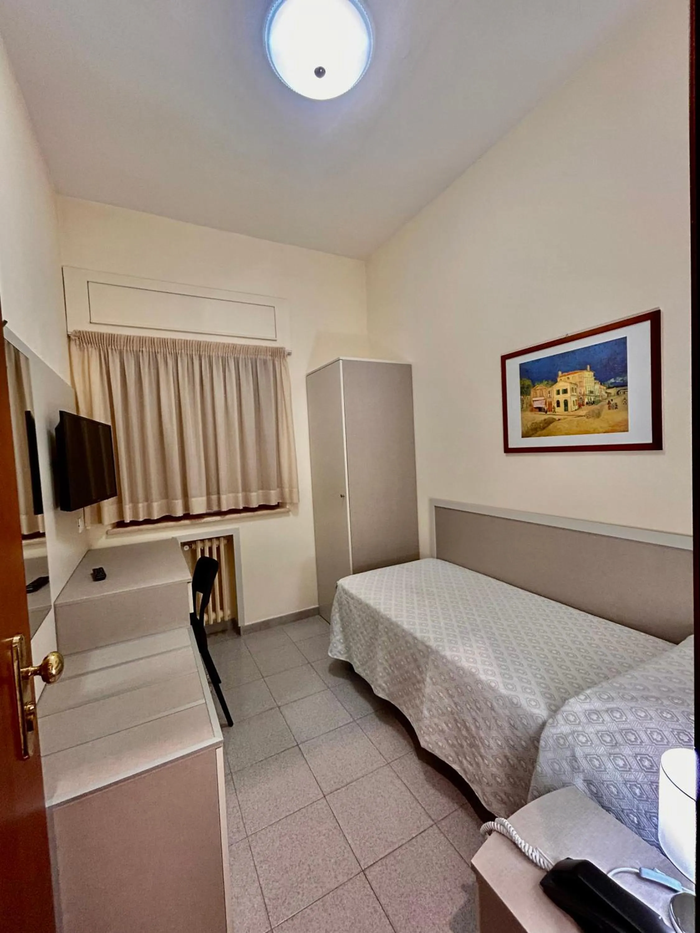 Bed in Il Nocchiero City Hotel