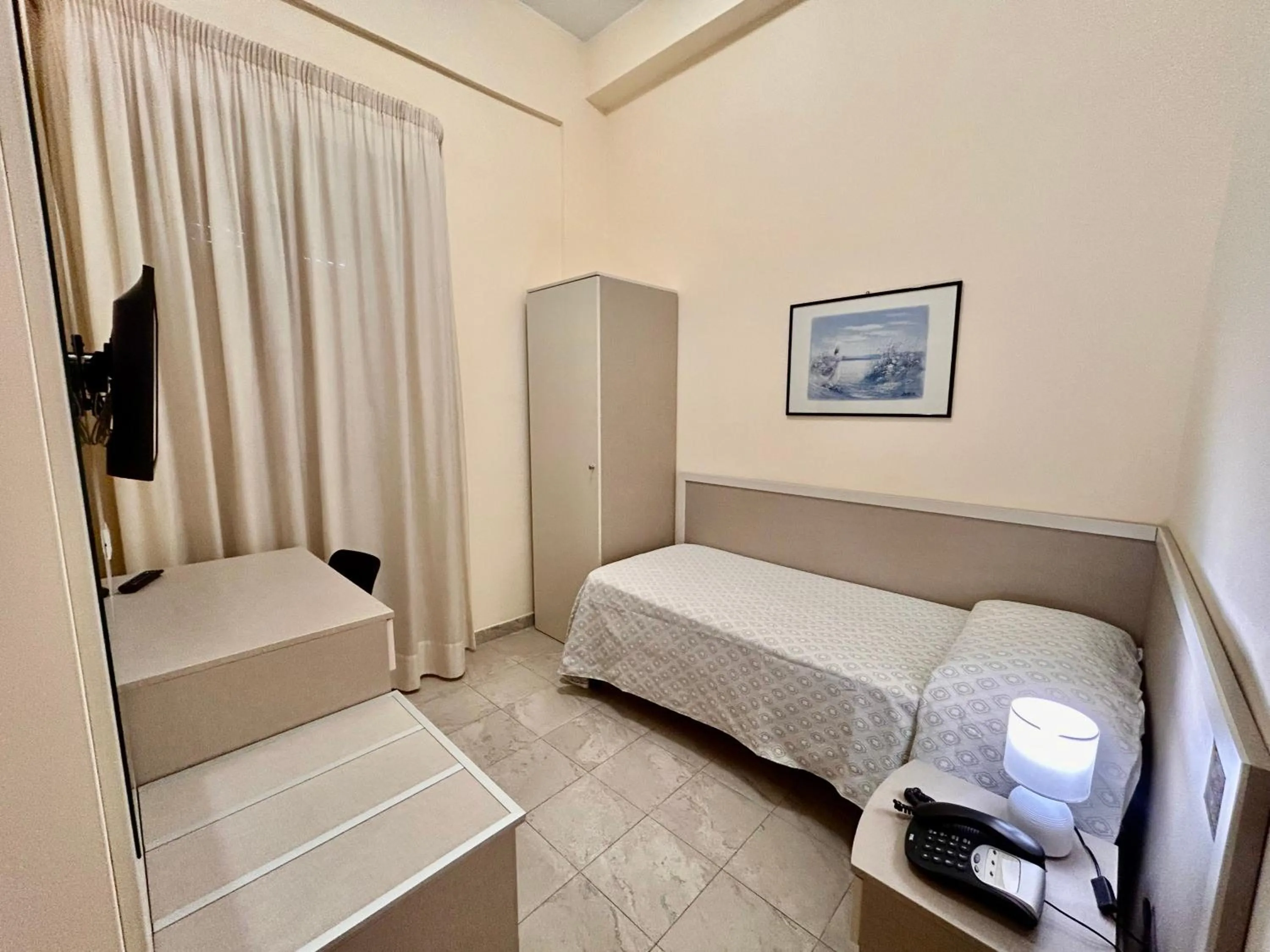 Bed in Il Nocchiero City Hotel