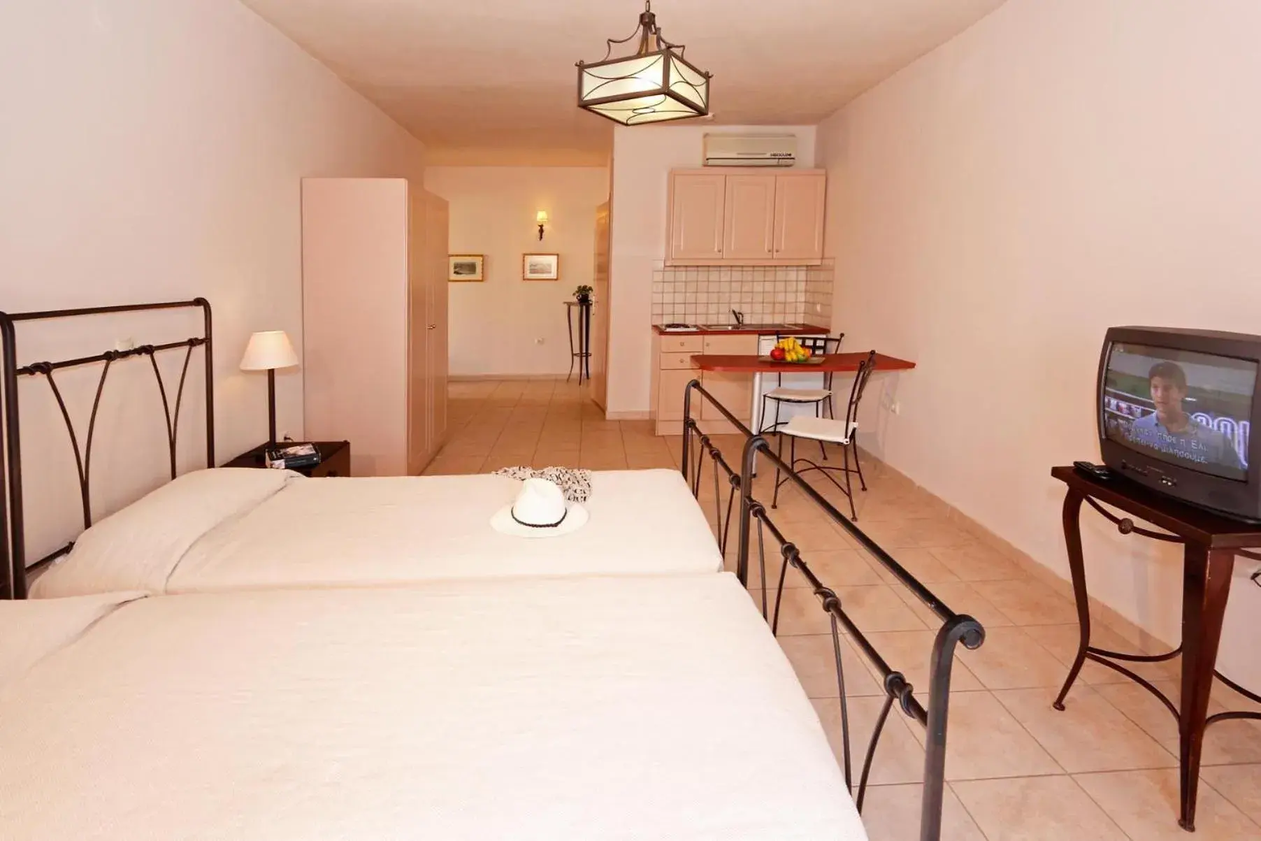 Photo of the whole room, Bed in Lambrinos Suites Photo of the whole room, Bed in Lambrinos Suites