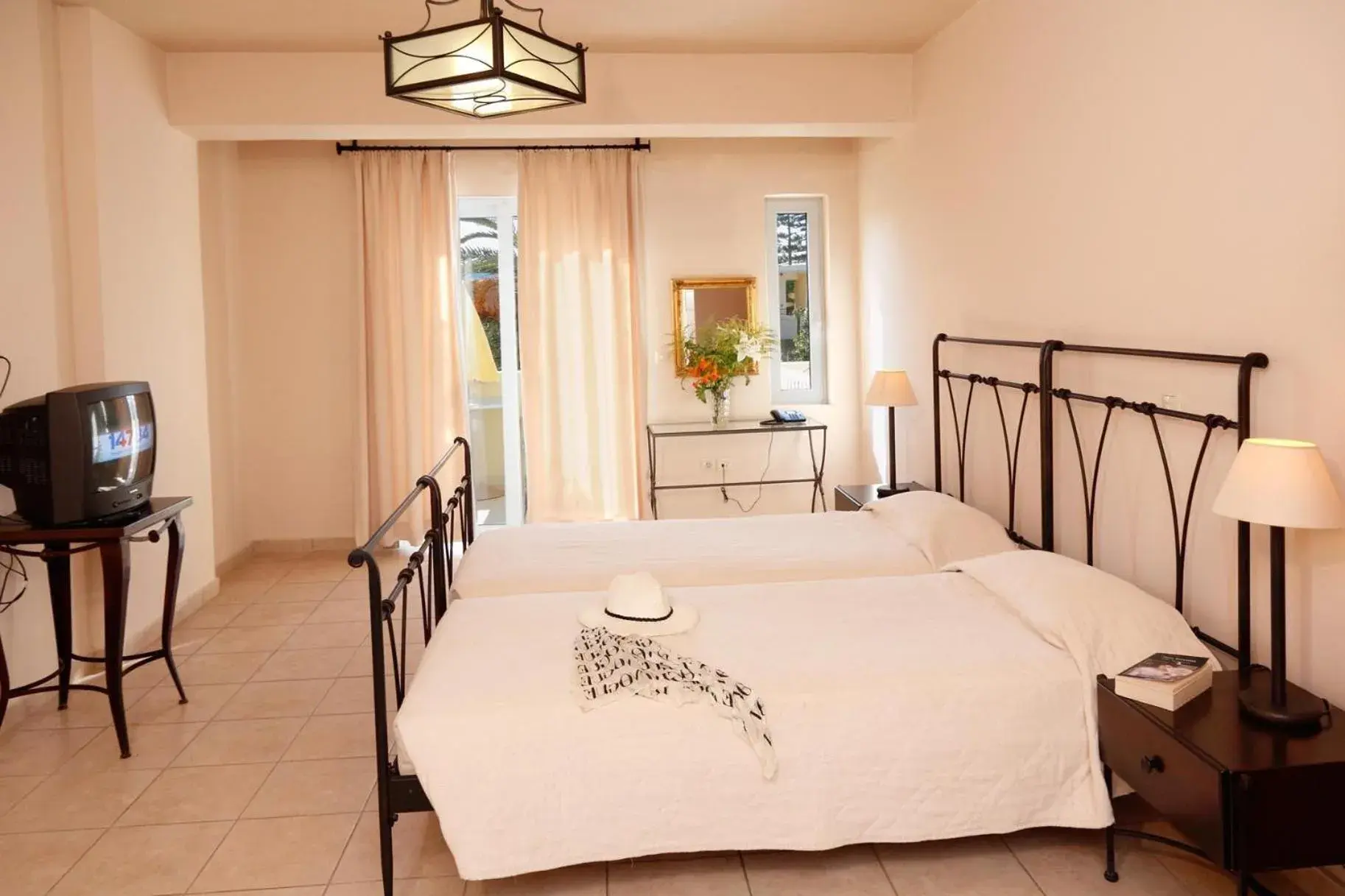 Photo of the whole room, Bed in Lambrinos Suites Photo of the whole room, Bed in Lambrinos Suites