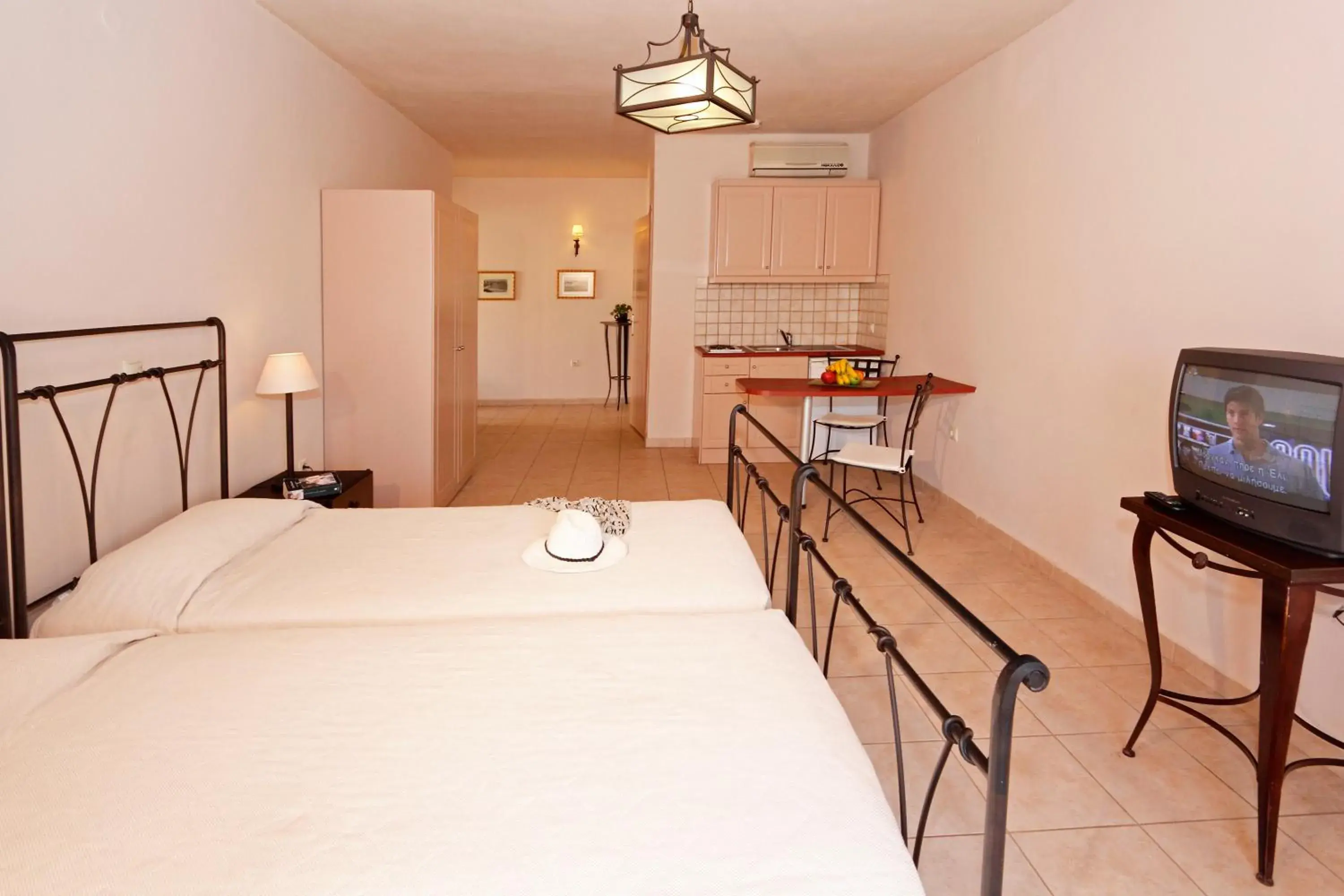 Photo of the whole room, Bed in Lambrinos Suites Photo of the whole room, Bed in Lambrinos Suites