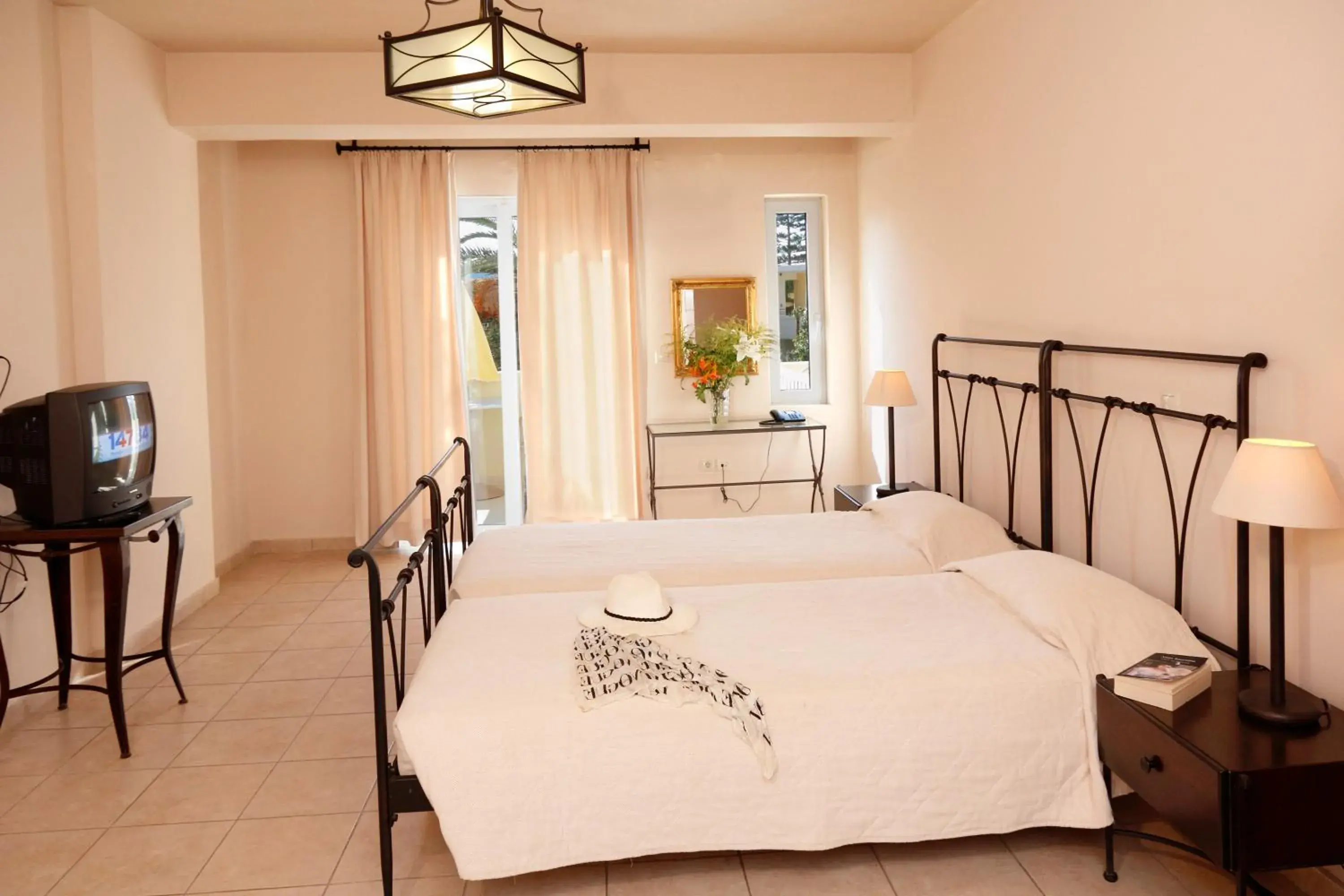 Photo of the whole room, Bed in Lambrinos Suites Photo of the whole room, Bed in Lambrinos Suites