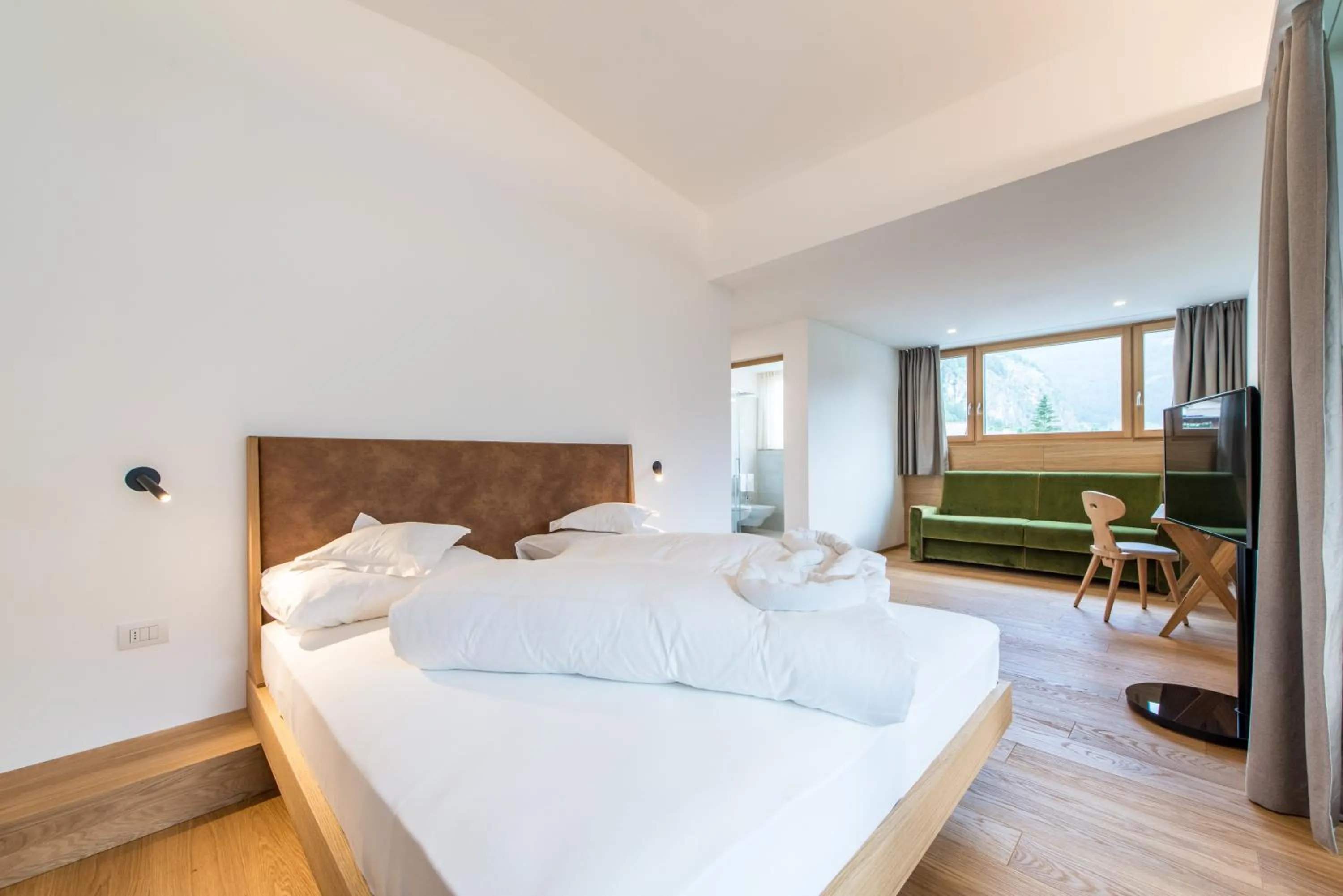 Bed in Hotel Taufers