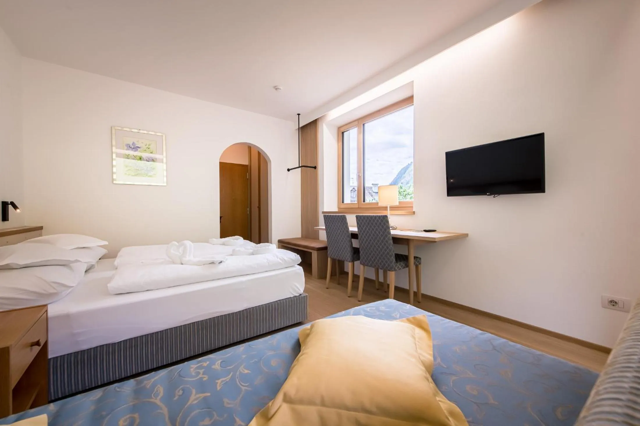 Bed in Hotel Taufers