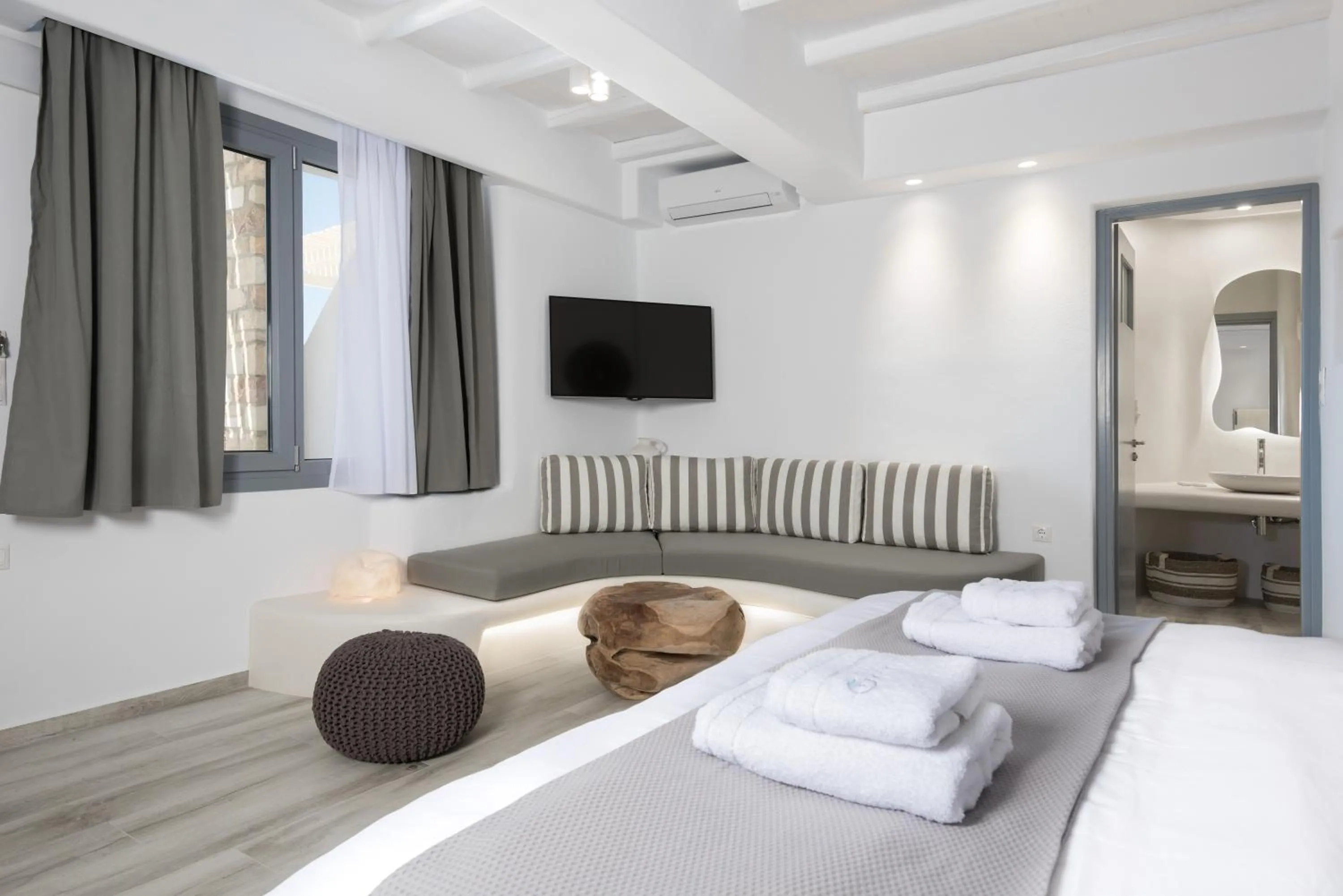 Bed in Iliada Suites