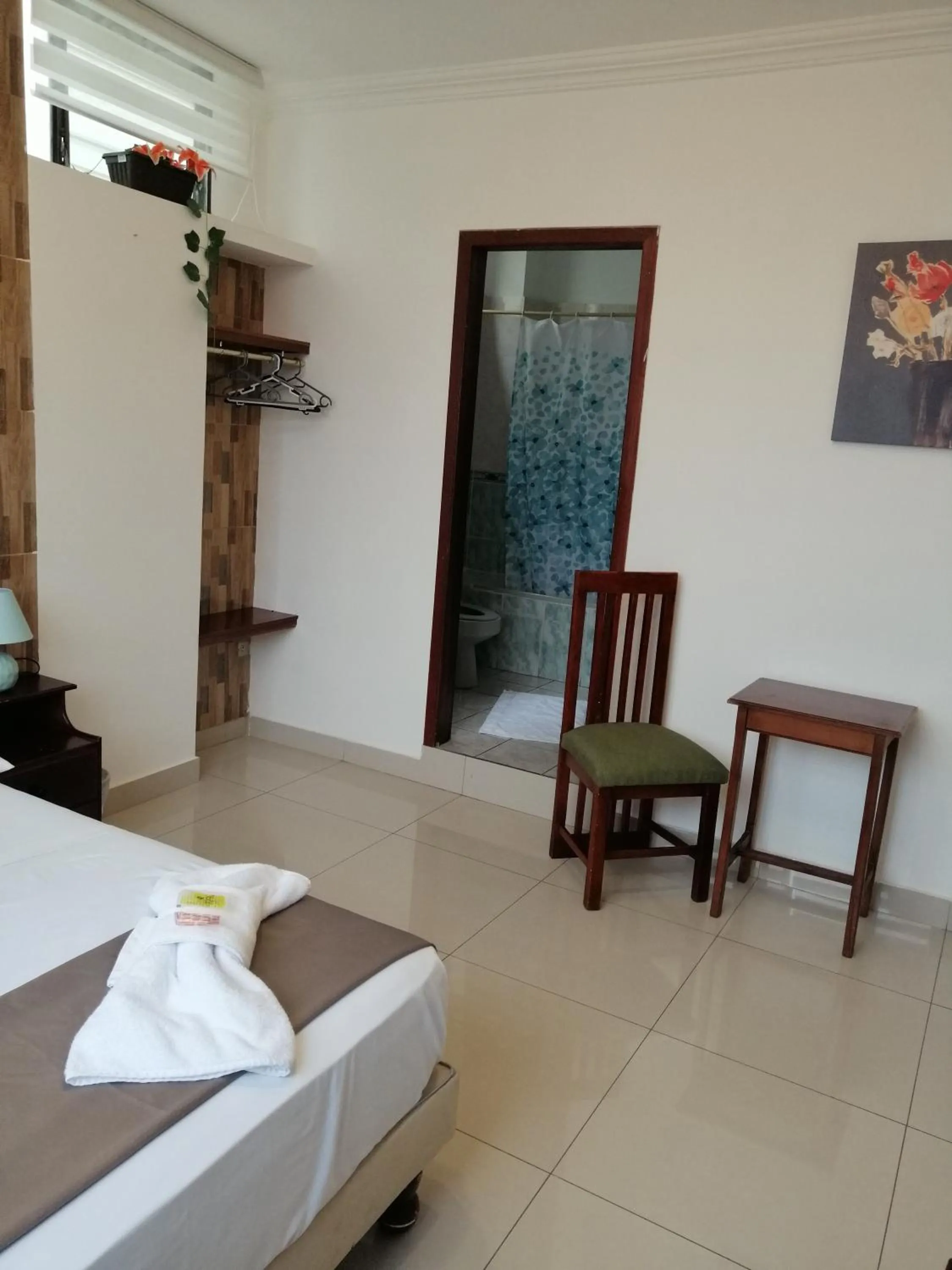 Bedroom, Bed in Hostal Perla Real Inn
