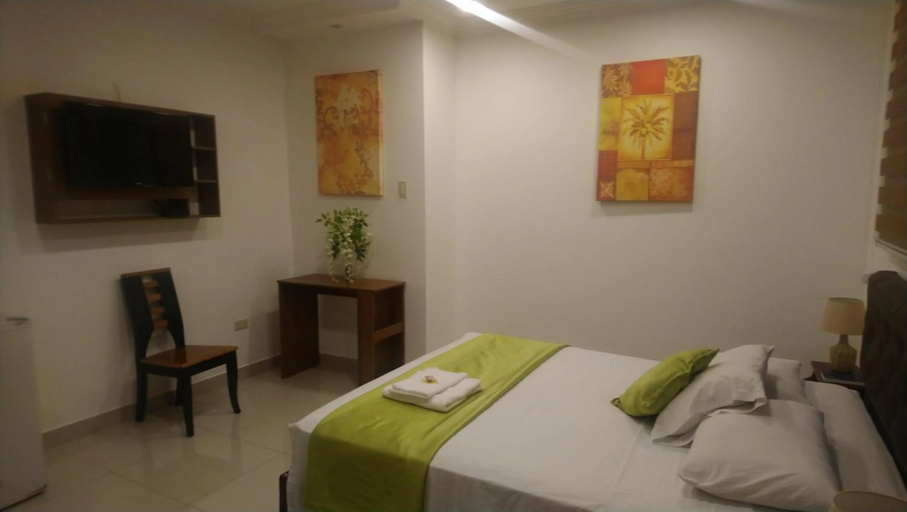 Bedroom, Bed in Hostal Perla Real Inn