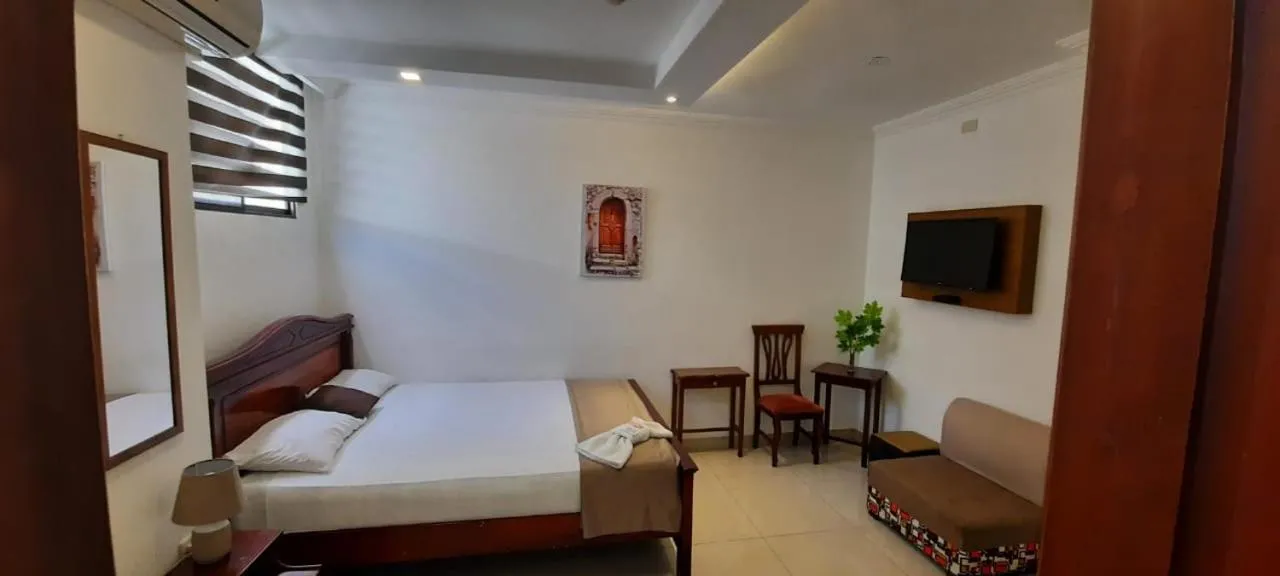 Bed in Hostal Perla Real Inn