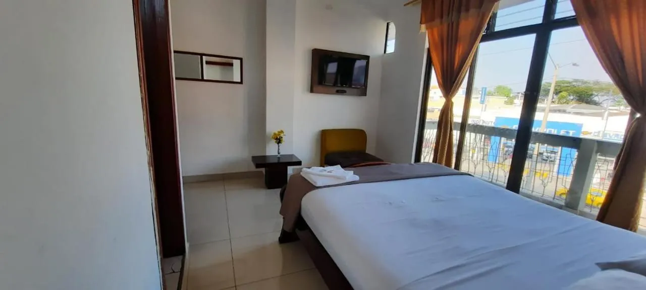 Bed in Hostal Perla Real Inn