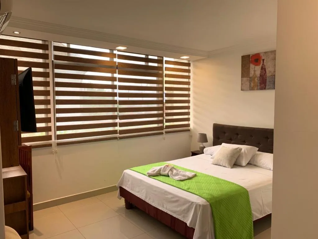 Bed in Hostal Perla Real Inn