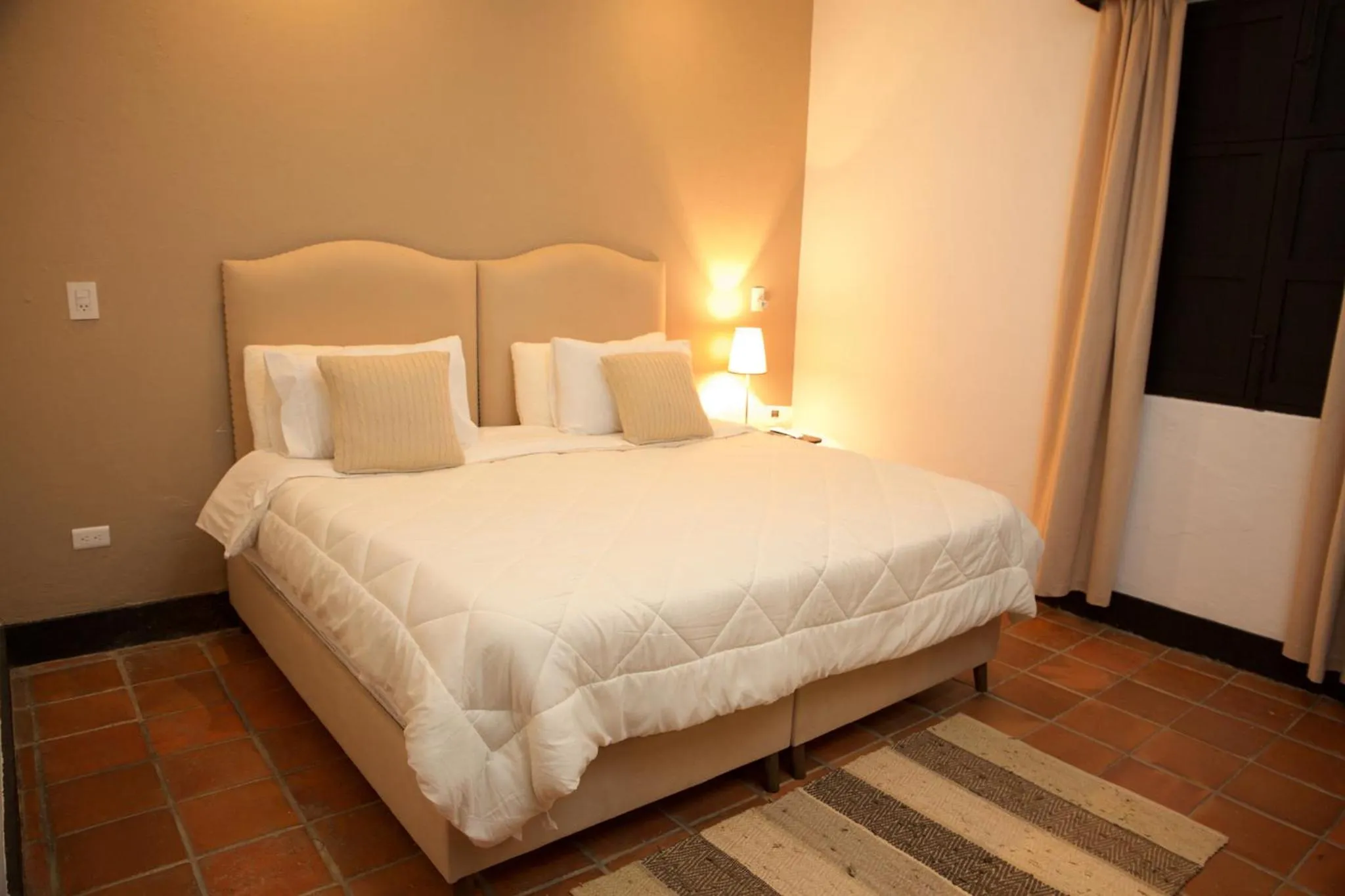 Bed in Hotel Hacienda Supracafe