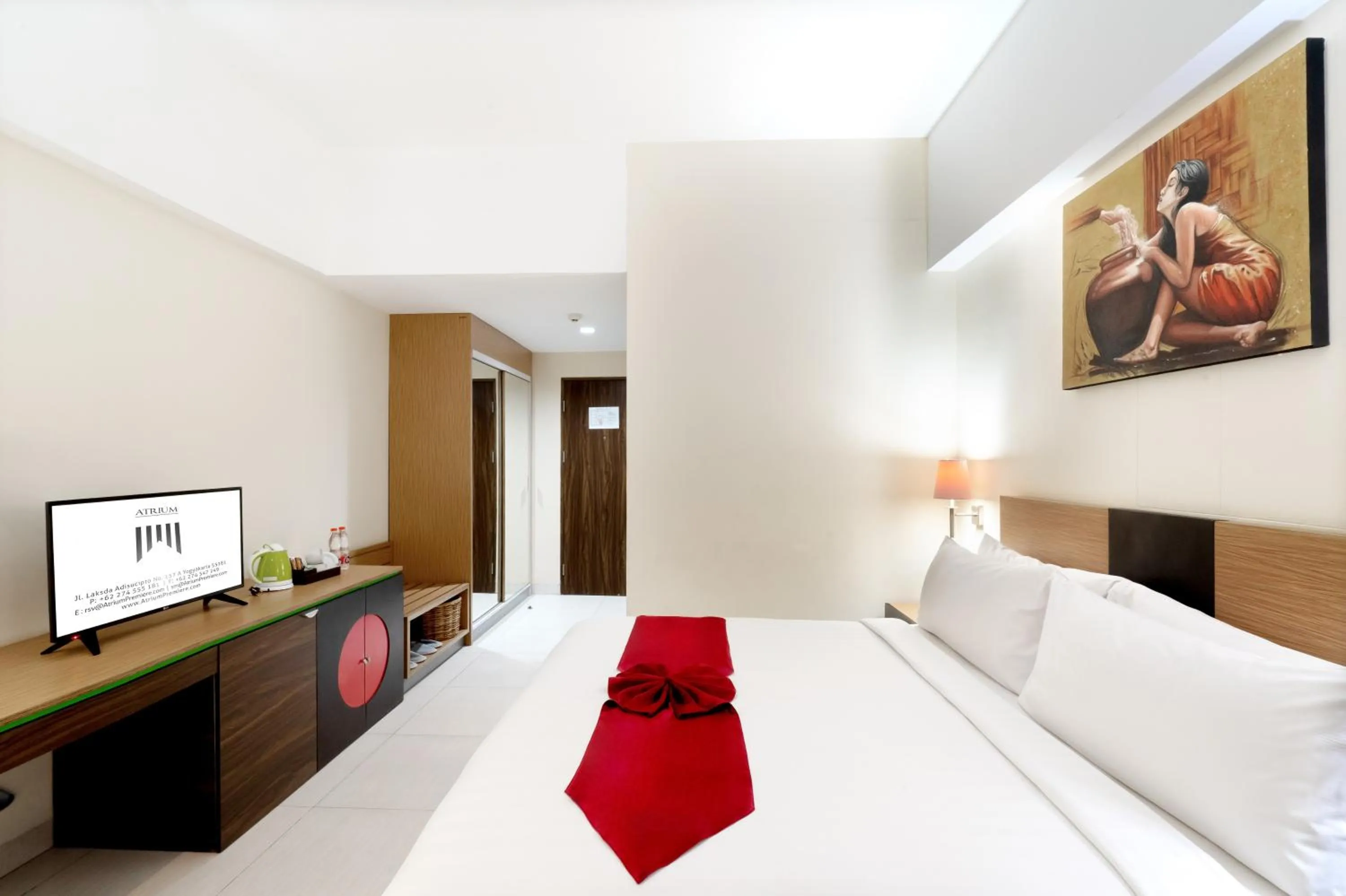 Bed in Atrium Premiere Hotel Yogyakarta Ambarukmo