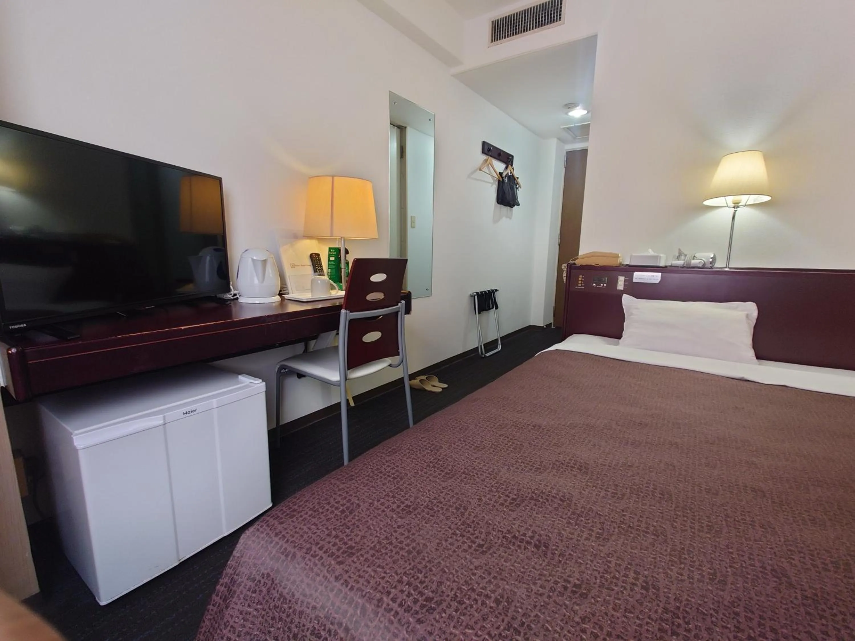 Bed in Select Inn Hamamatsu Ekimae