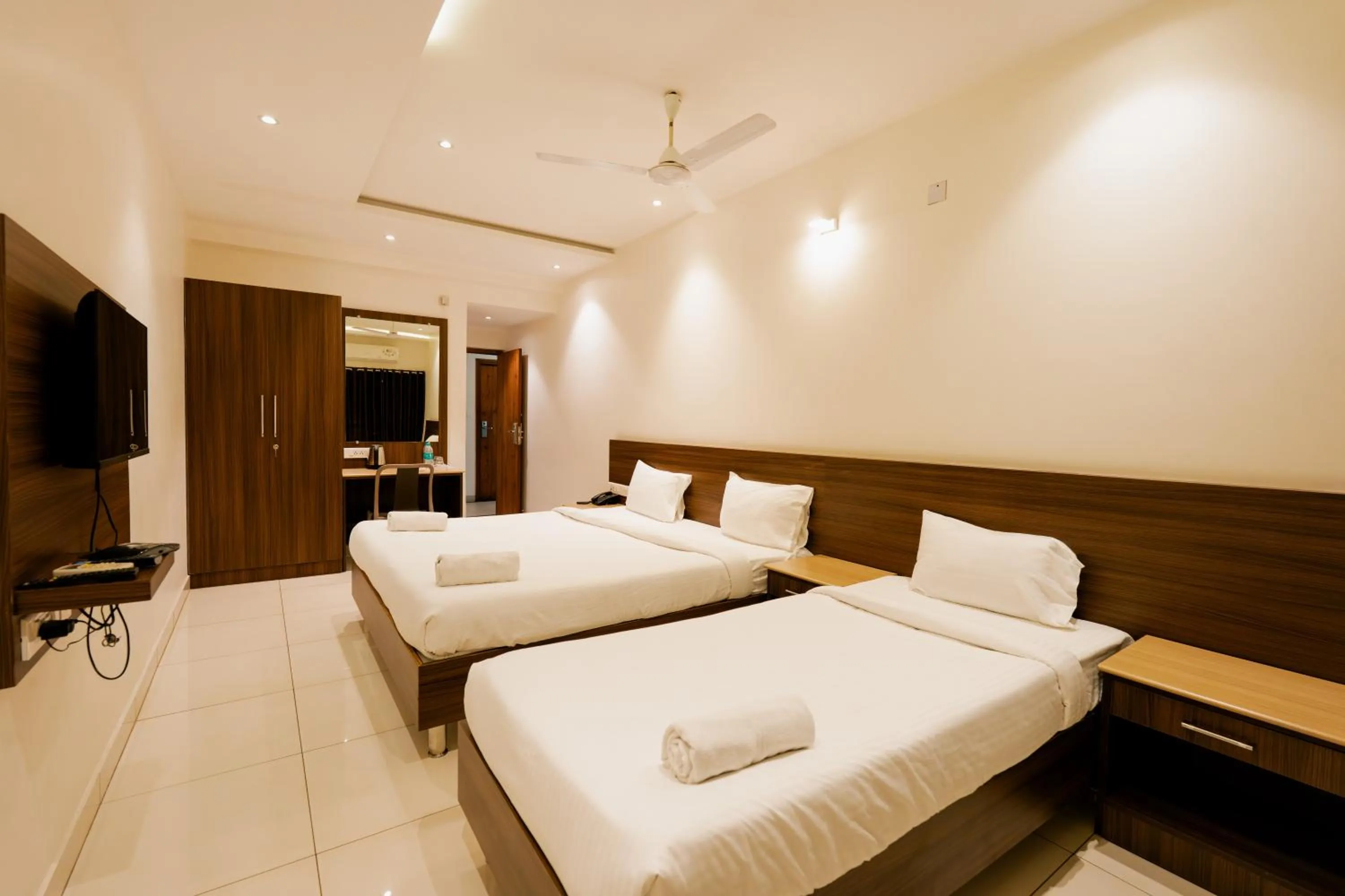 Bed in Hotel Karuna Residency