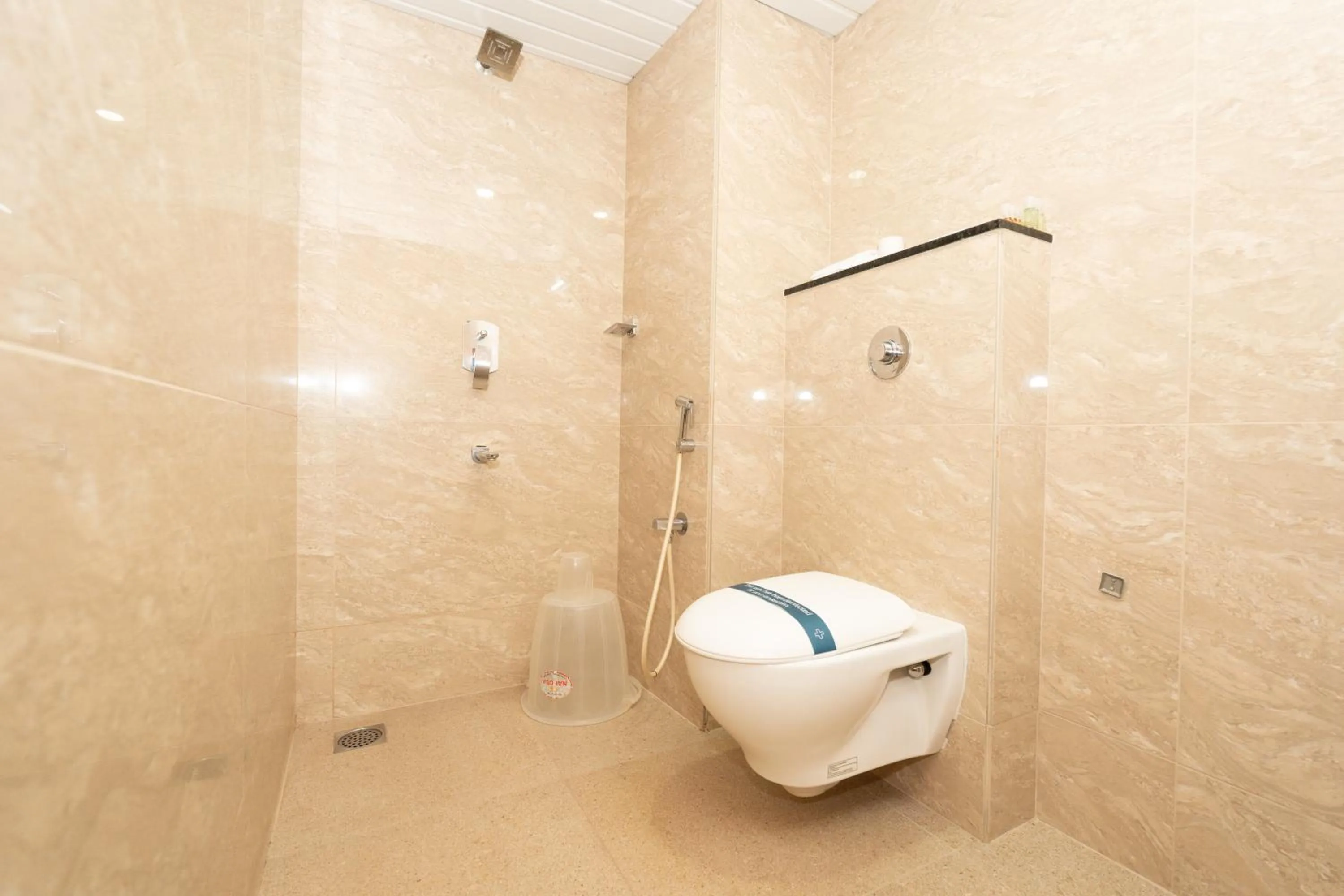 Bathroom in Hotel Karuna Residency