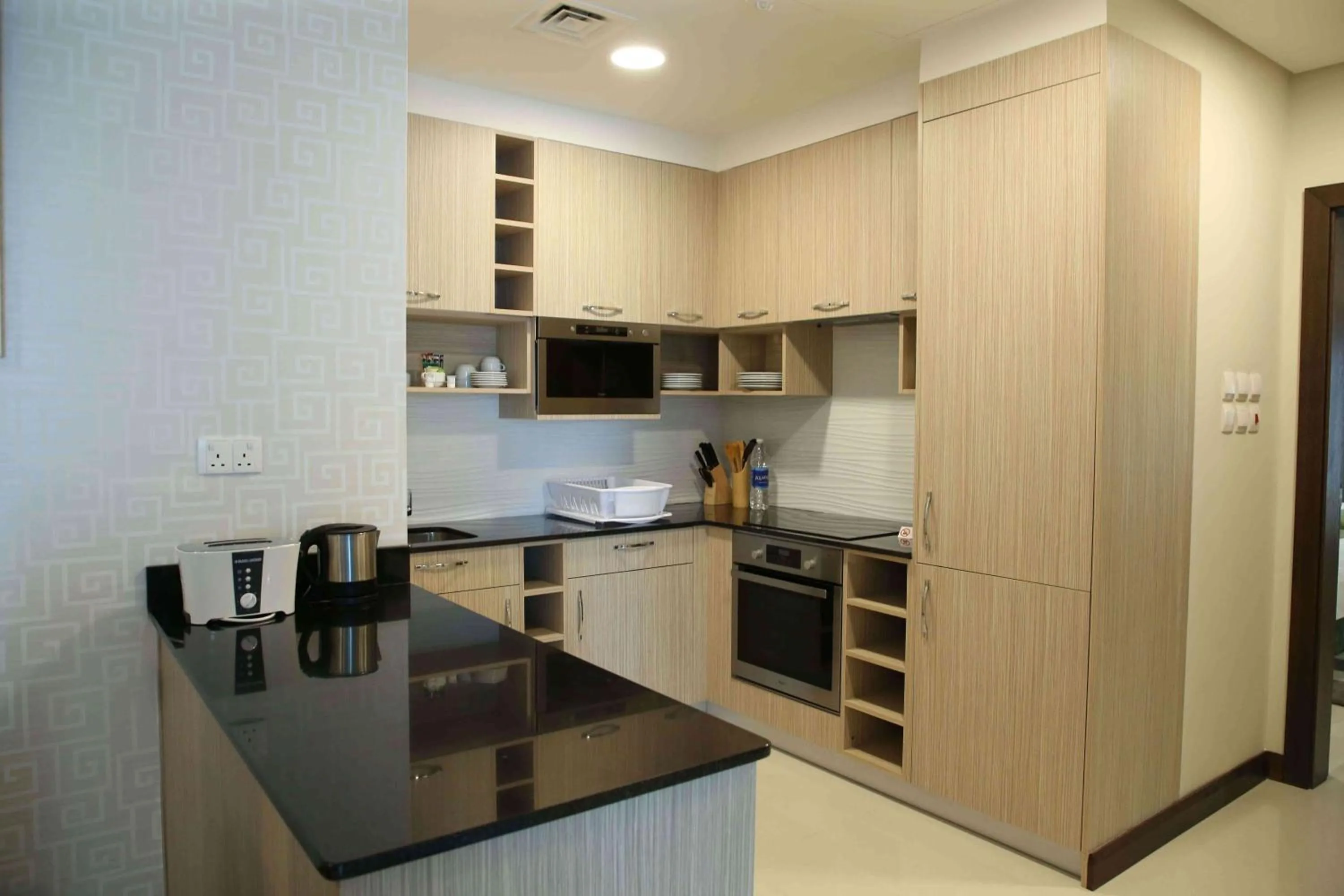 Kitchen or kitchenette in Gulf Executive Hotel & Residence Juffair