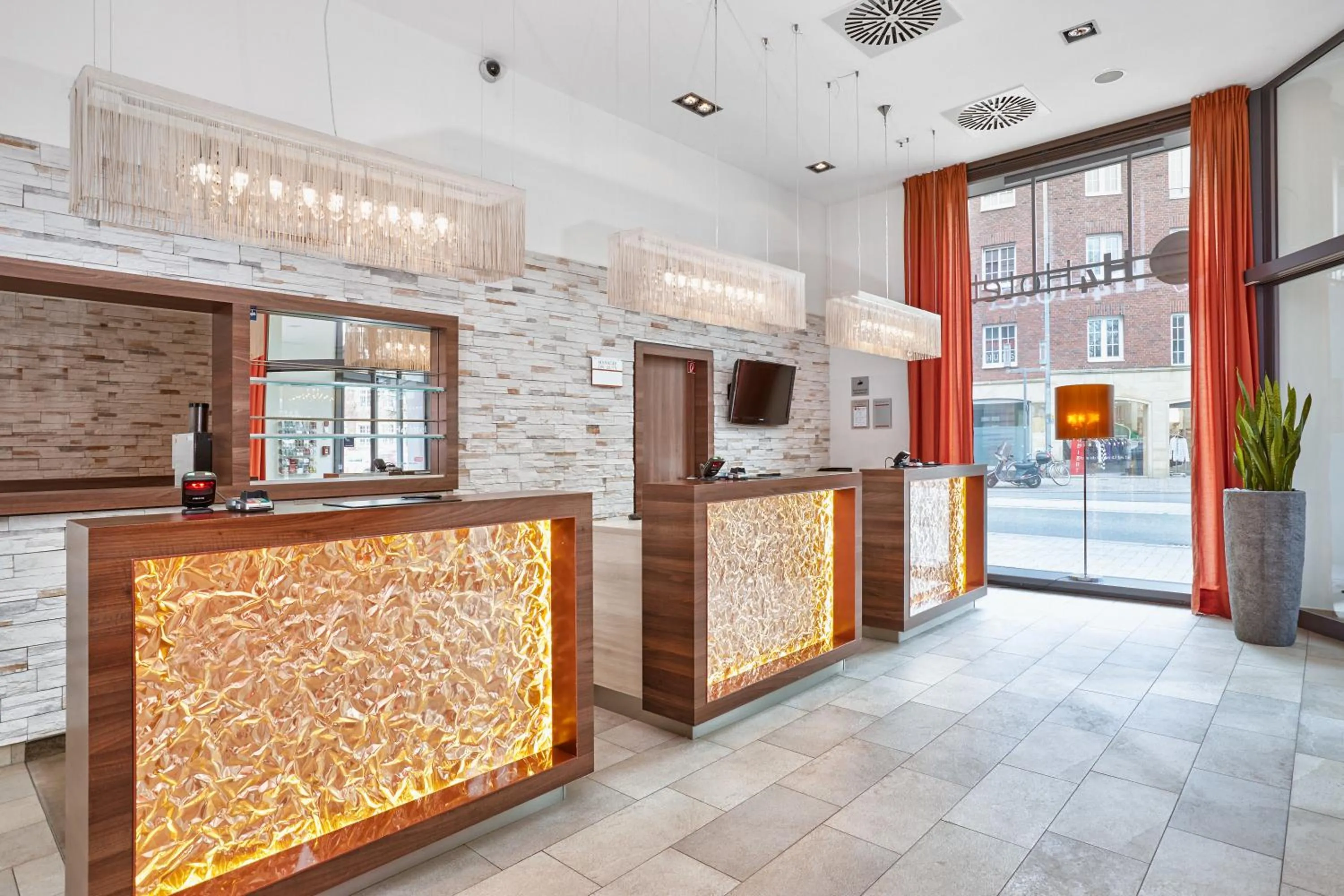 Lobby or reception in H4 Hotel Münster