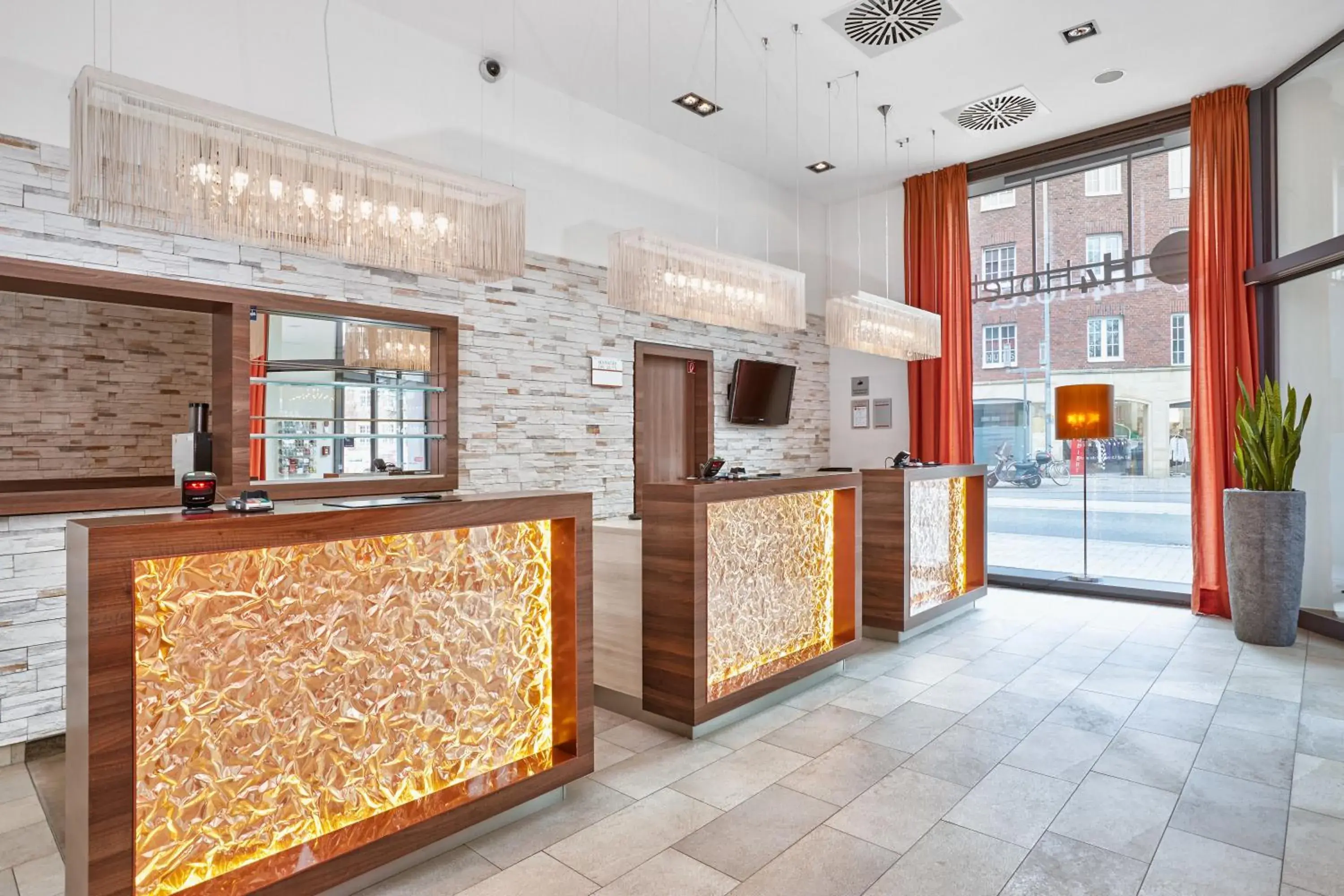 Lobby or reception in H4 Hotel Münster Lobby or reception in H4 Hotel Münster
